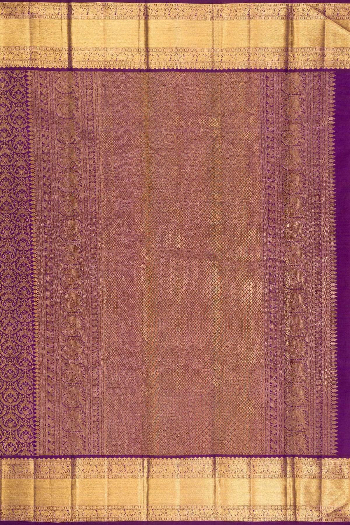 Close up image of the pallu of Purple Kanchipuram Silk Saree with Zari Brocade on the body and Zari Border. 