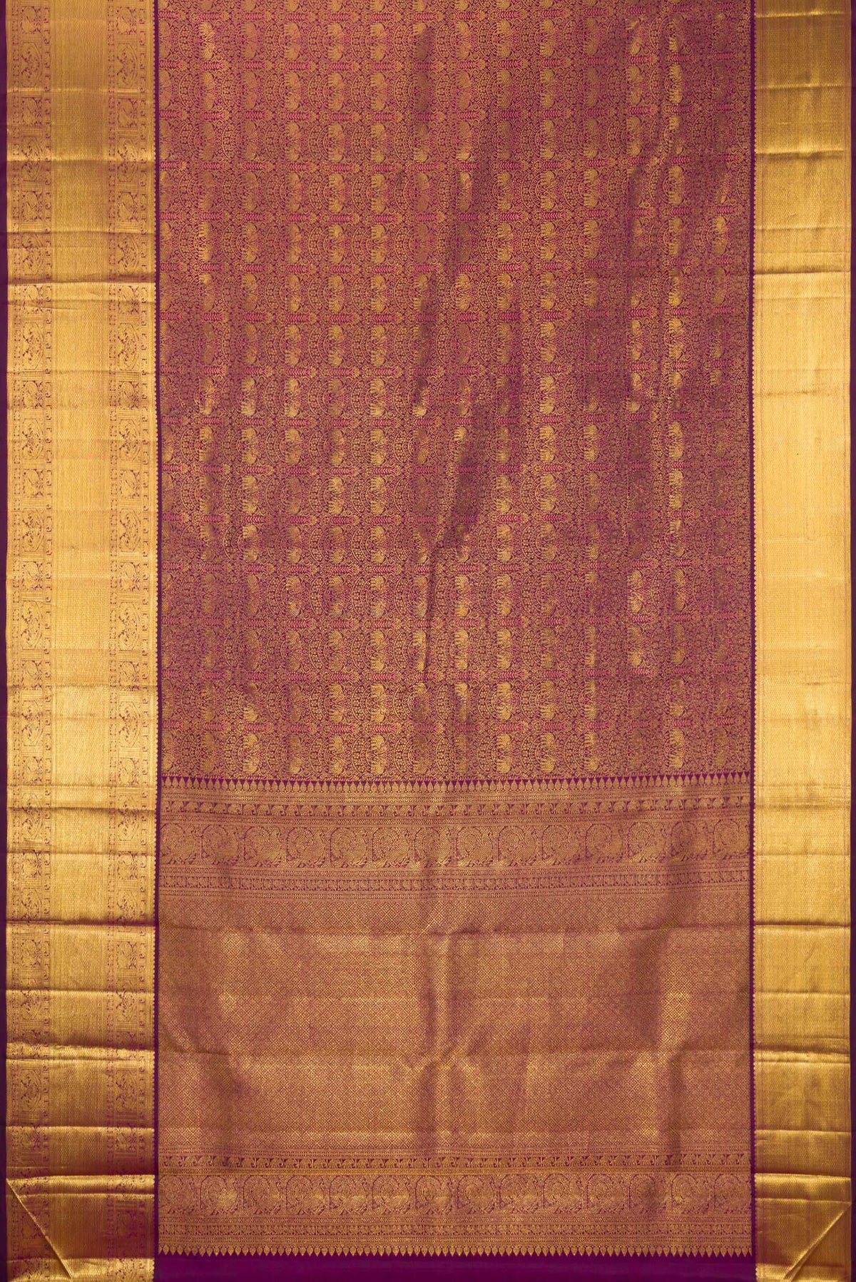 Flat view of Pure Silk Purple Kanchipuram Saree with Zari Brocade on the body and Zari Border. 