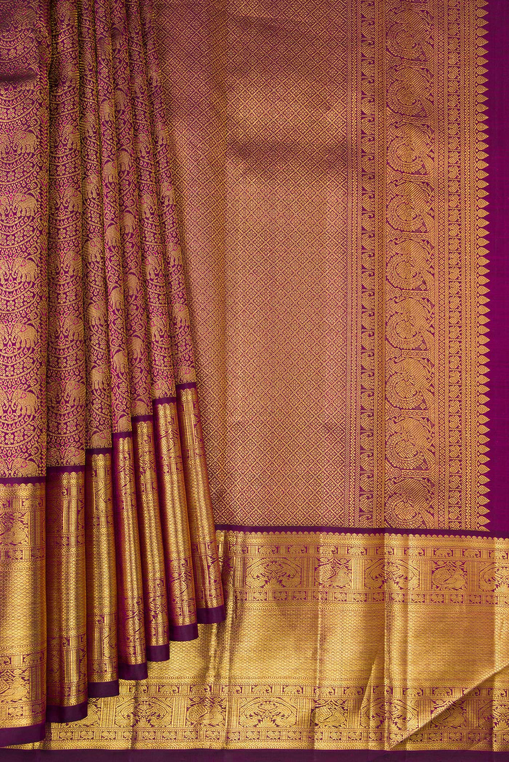 Pleats and pallu of Pure Silk Purple Kanchipuram Saree with Zari Brocade on the body and Zari Border. 