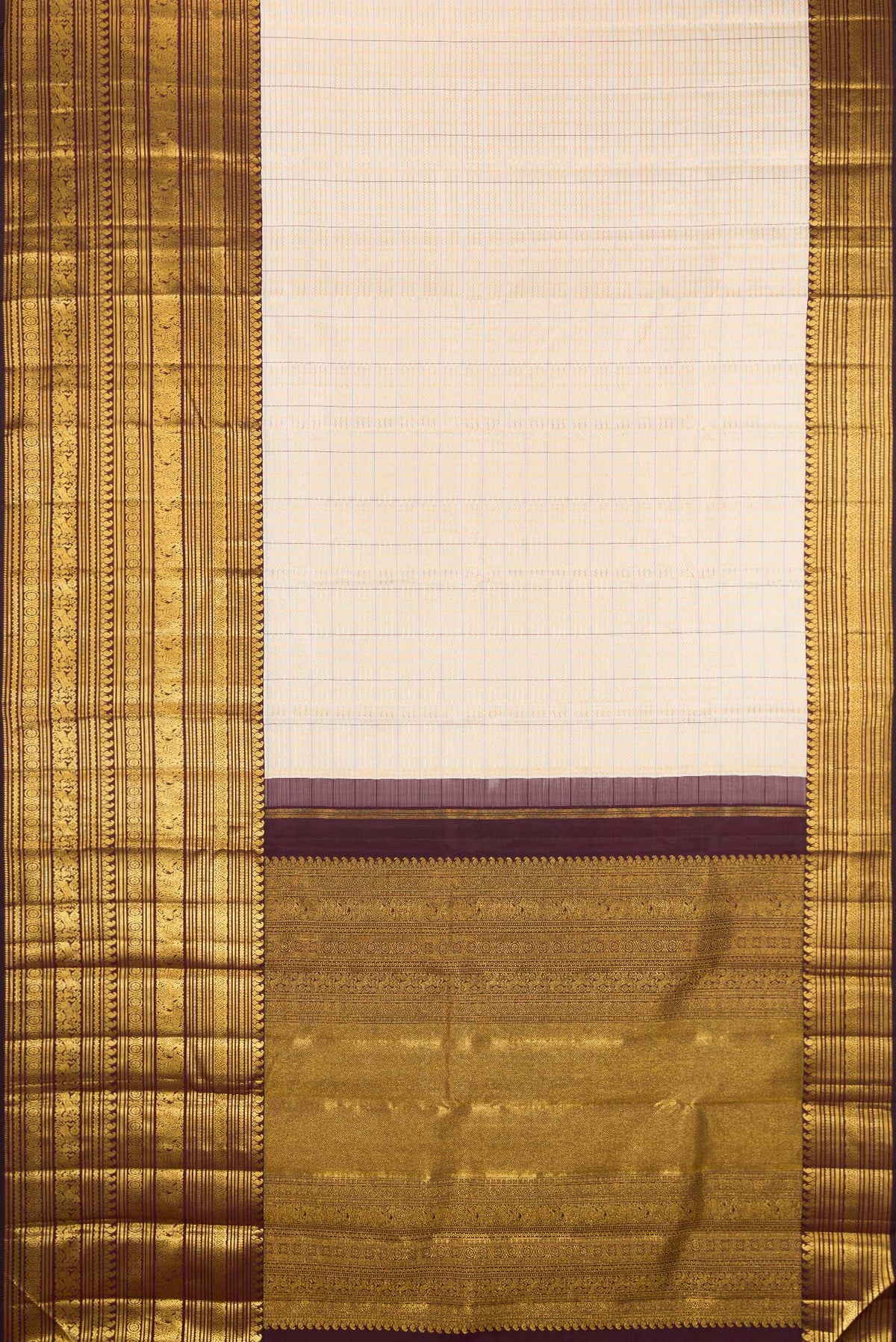 Flat view of Cream Kanchipuram Silk Saree with Checked design on the body and Zari Border. 
