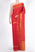 Pure Silk Red Kanjivaram Saree with Zari Butta on the body and Zari Border.  displayed on a mannequin