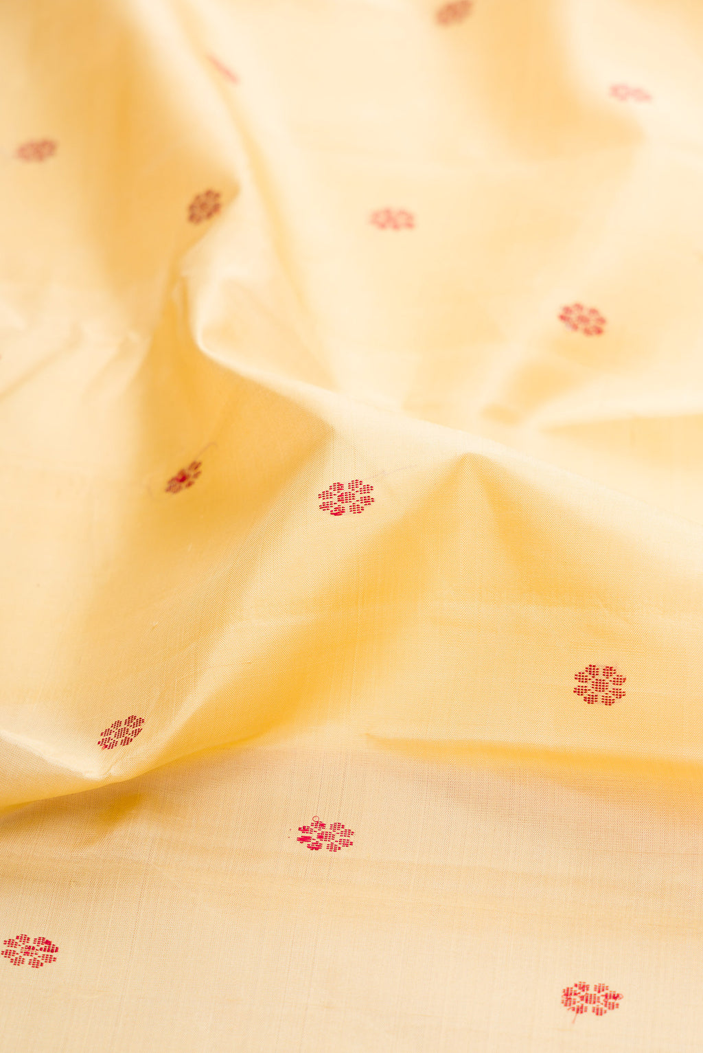 Close up of Sandal Kanjivaram Silk Saree with Thread Butta on the body and Thread Border.  displaying folds