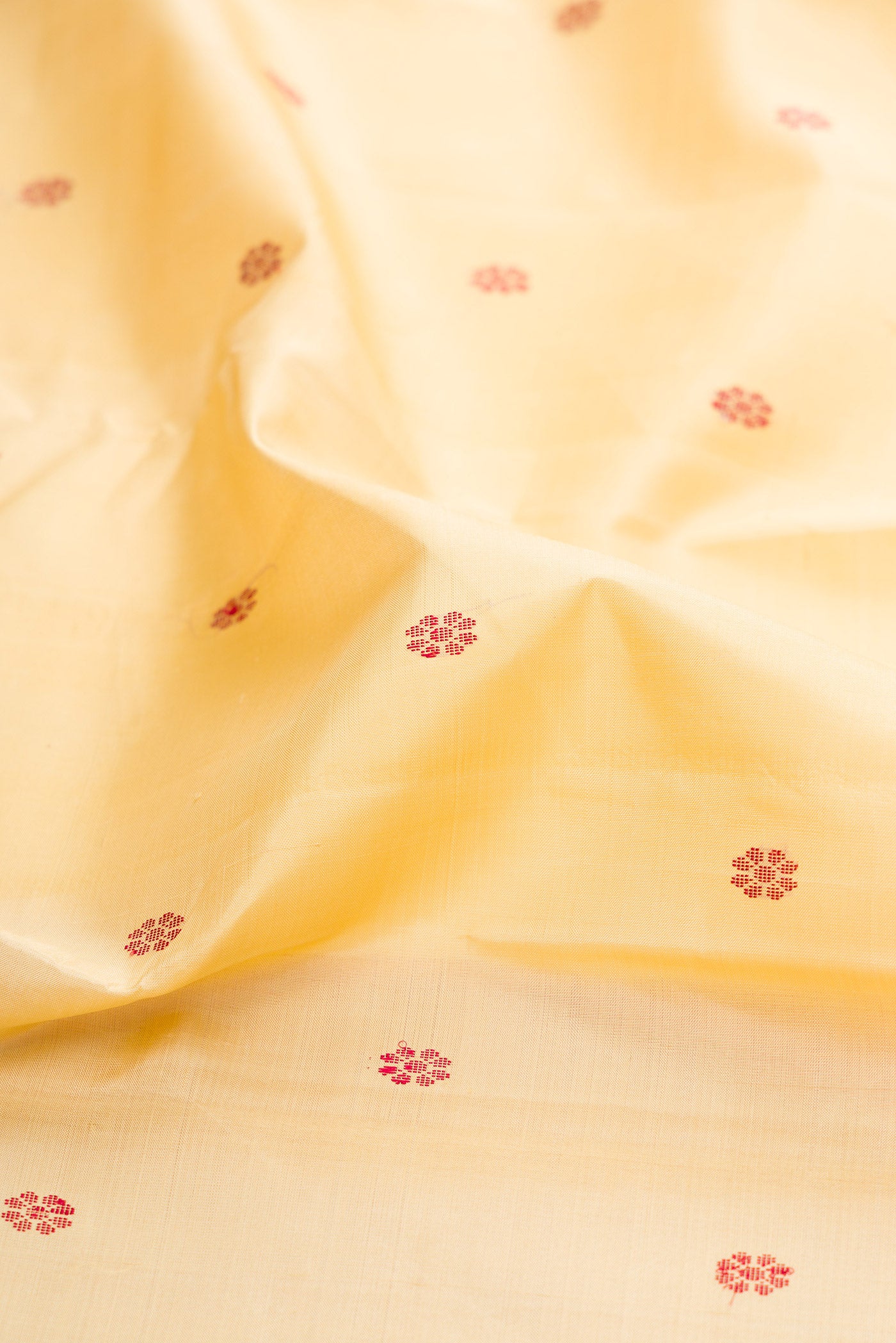 Close up of Sandal Kanjivaram Silk Saree with Thread Butta on the body and Thread Border.  displaying folds