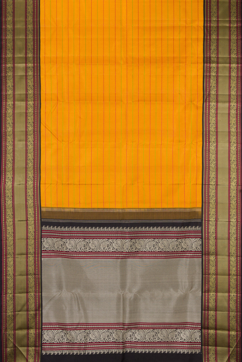 Flat view of Mustard Kanjivaram Silk Saree with Veldhari on the body and Thread Border. 