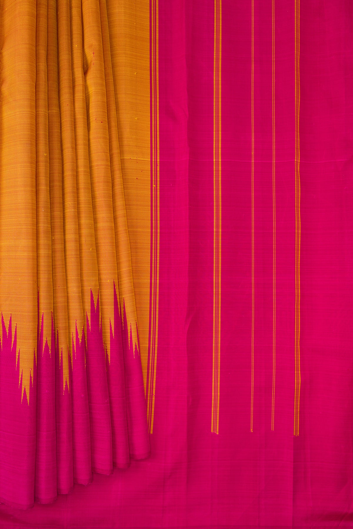 Pleats and pallu of Pure Silk Mustard Dual Tone Kanchipuram Saree with Plain Body and Temple Border. 