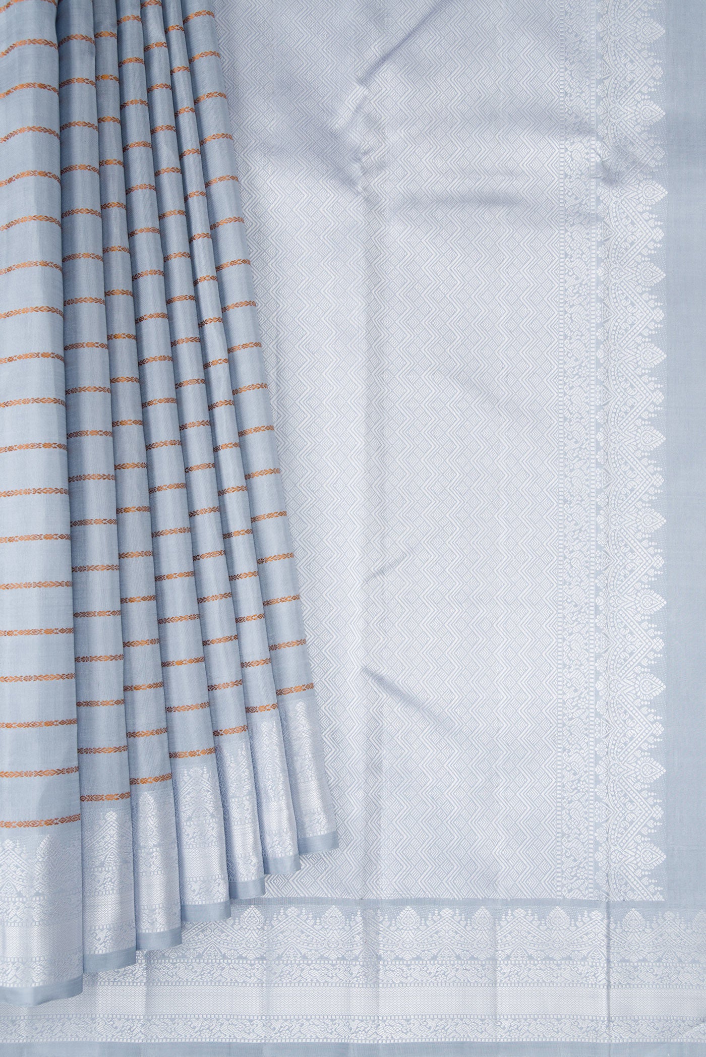 Pleats and pallu of Lilac Kanjivaram Silk Saree with Veldhari on the body and Thread Border. 