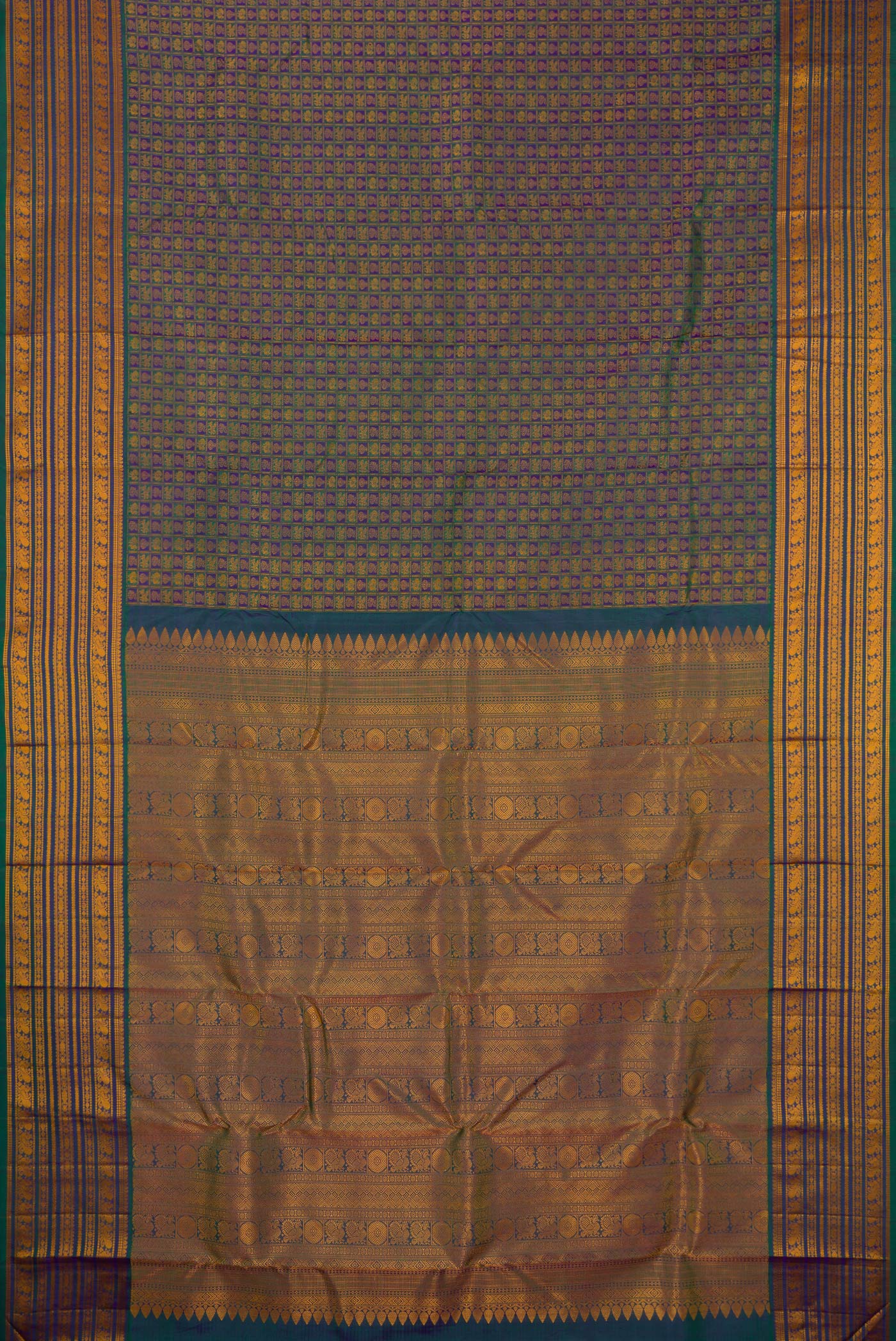Flat view of Peacock Blue Dual Tone Kanjivaram Silk Saree with Jacquard design on the body and Thread Border. 