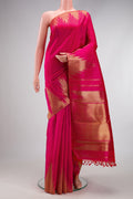 Pure Silk Pure Zari Pink Kanchipuram Saree with Plain Body and Temple Border.  displayed on a mannequin