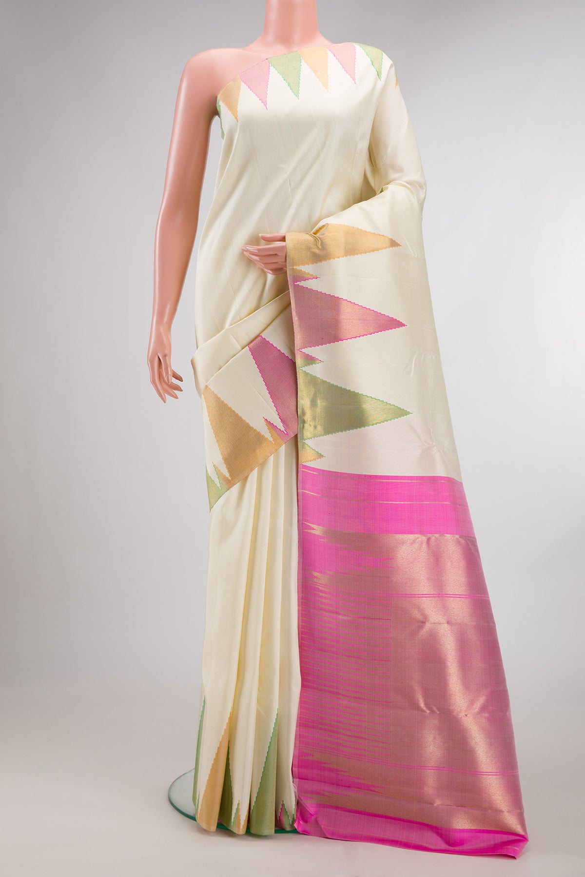 Pure Silk Pure Zari Off White Kanjivaram Saree with Plain Body and Temple Border.  displayed on a mannequin