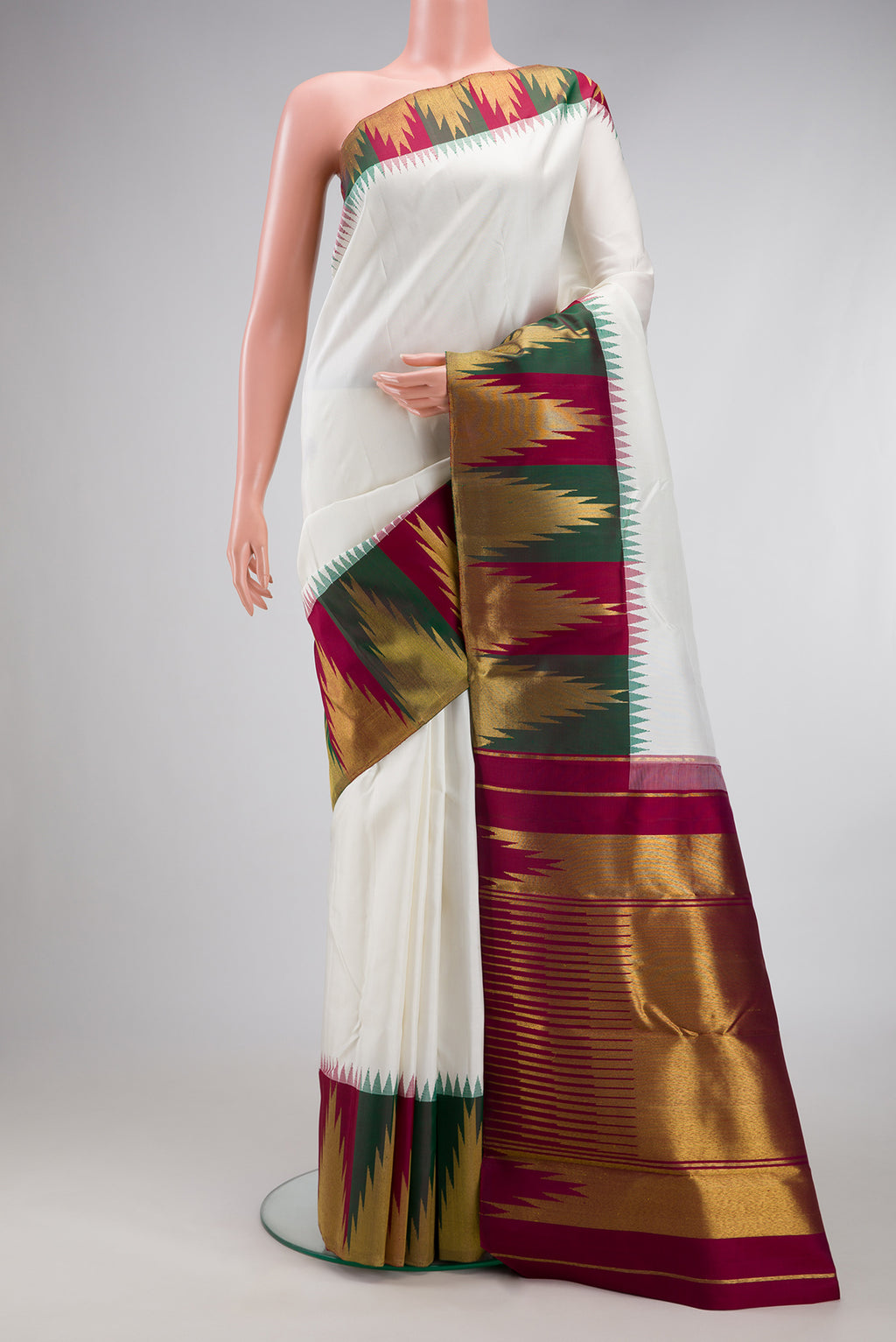 Pure Silk Pure Zari White Kanjivaram Saree with Plain Body and Temple Border.  displayed on a mannequin