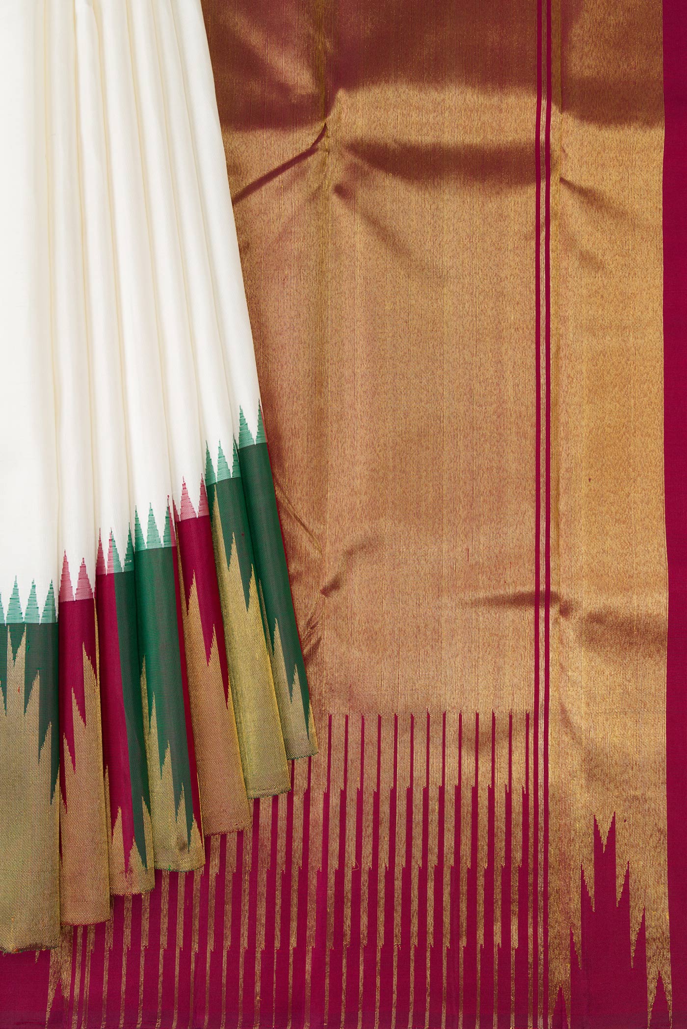 Pleats and pallu of Pure Silk Pure Zari White Kanjivaram Saree with Plain Body and Temple Border. 