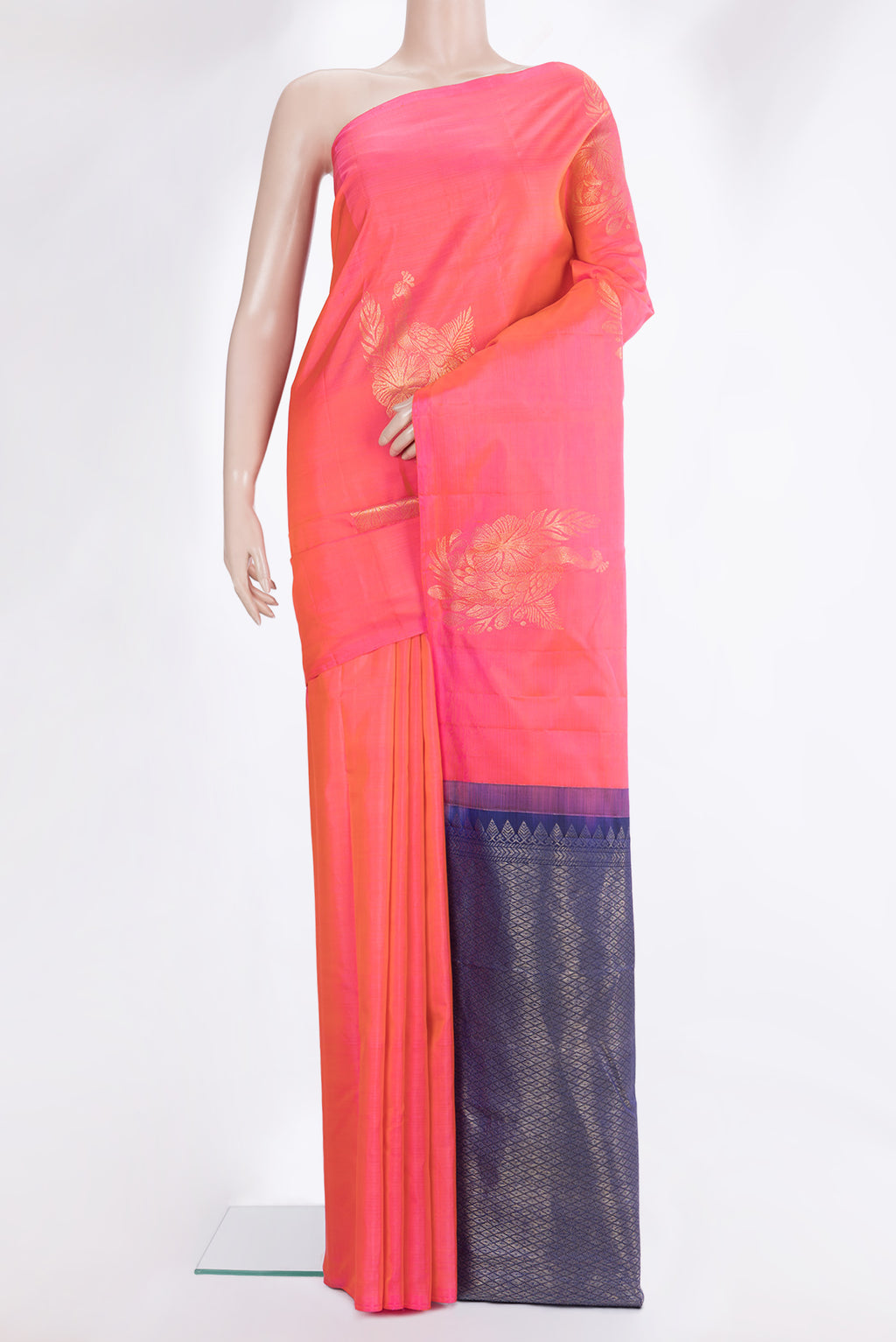 Pure Silk Pink Dual Tone Kanchipuram Saree with Zari Butta on the body and Without Border.  displayed on a mannequin