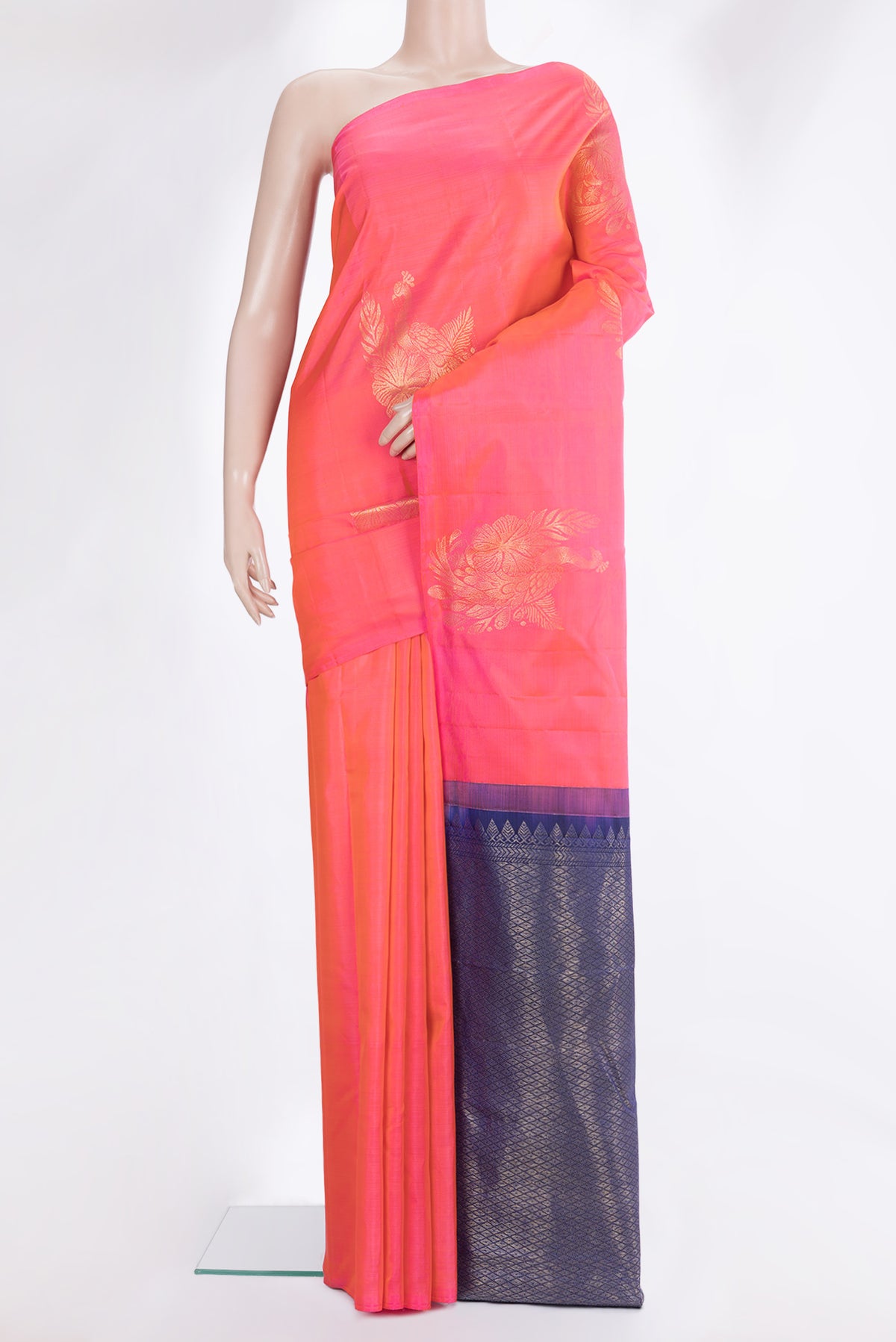 Pure Silk Pink Dual Tone Kanchipuram Saree with Zari Butta on the body and Without Border.  displayed on a mannequin