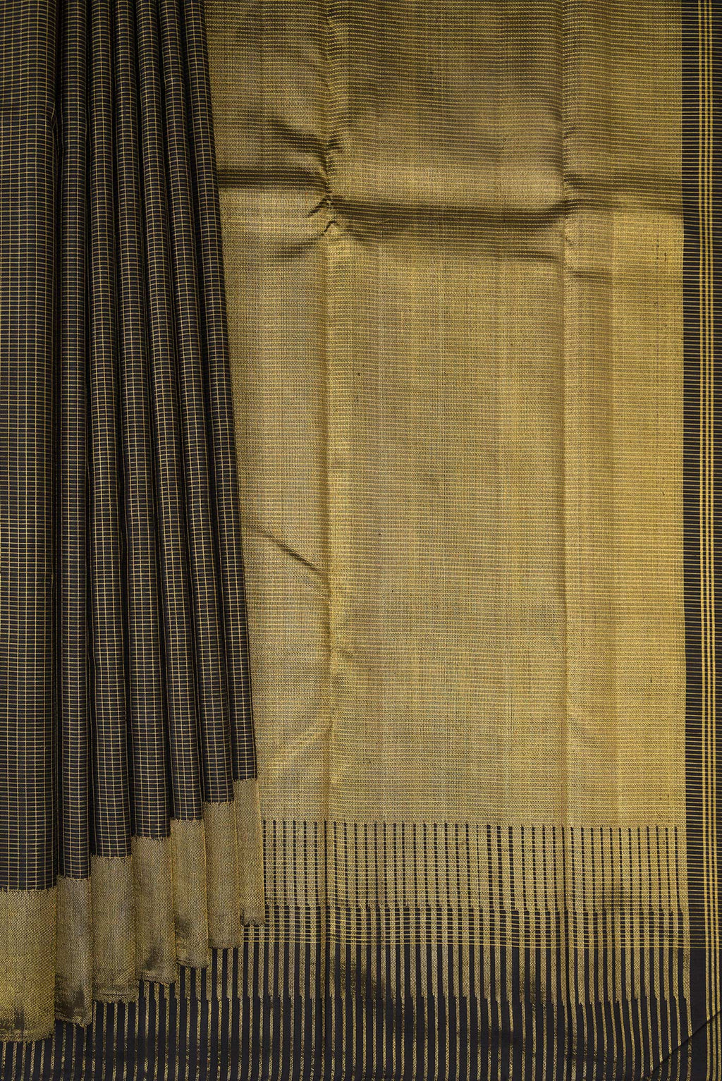 Pleats and pallu of Black Kanchipuram Silk Saree with Checked design on the body and Zari Border. 