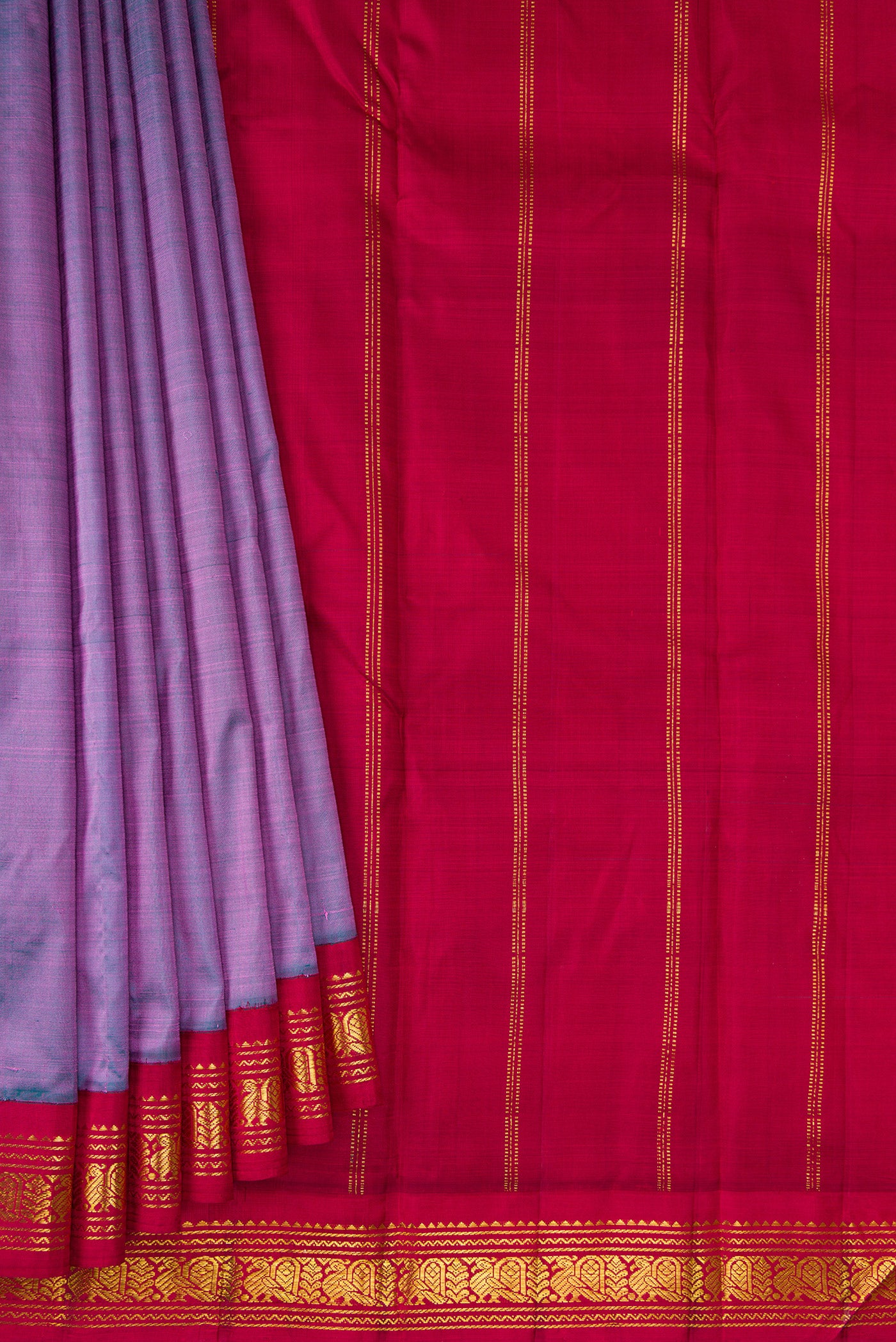 Pleats and pallu of Pure Silk Pure Zari Purple Dual Tone Kanjivaram Saree with Plain Body and One Side Border. 