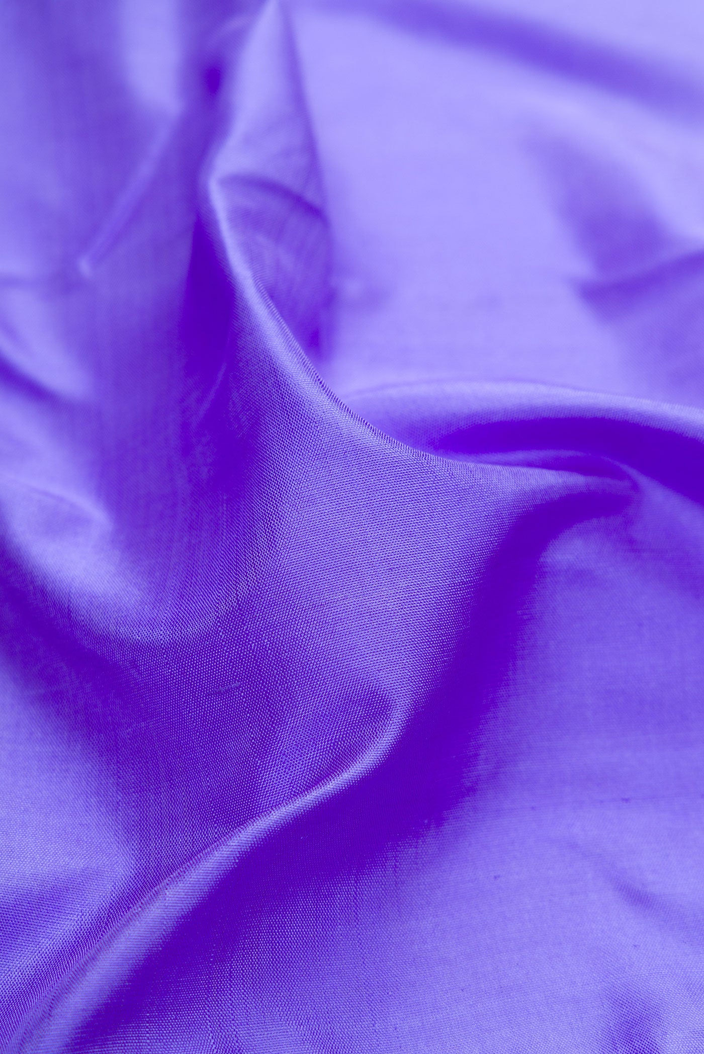 Close up of Pure Silk Pure Zari Maya Blue Kanjivaram Saree with Plain Body and One Side Border.  displaying folds