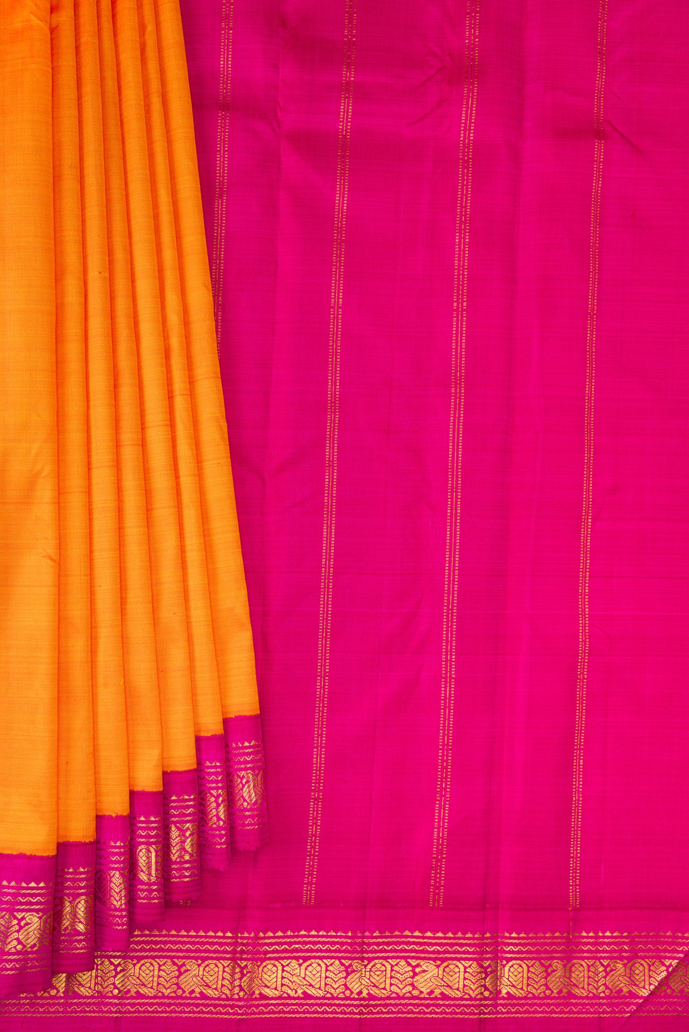 Pleats and pallu of Pure Silk Pure Zari Orange Kanjivaram Saree with Plain Body and One Side Border. 