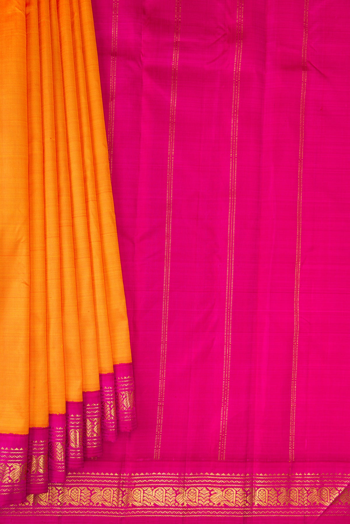 Pleats and pallu of Pure Silk Pure Zari Orange Kanjivaram Saree with Plain Body and One Side Border. 