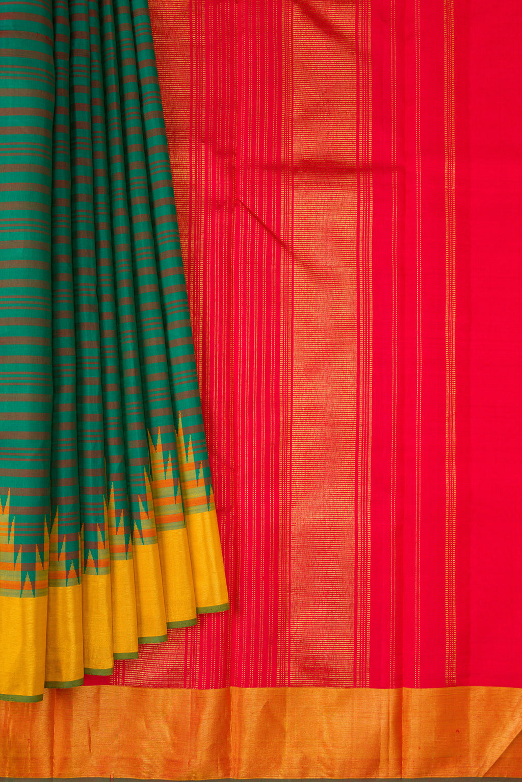 Pleats and pallu of Bottle Green Dual Tone Kanjivaram Silk Saree with Stripes on the body and Temple Border. 