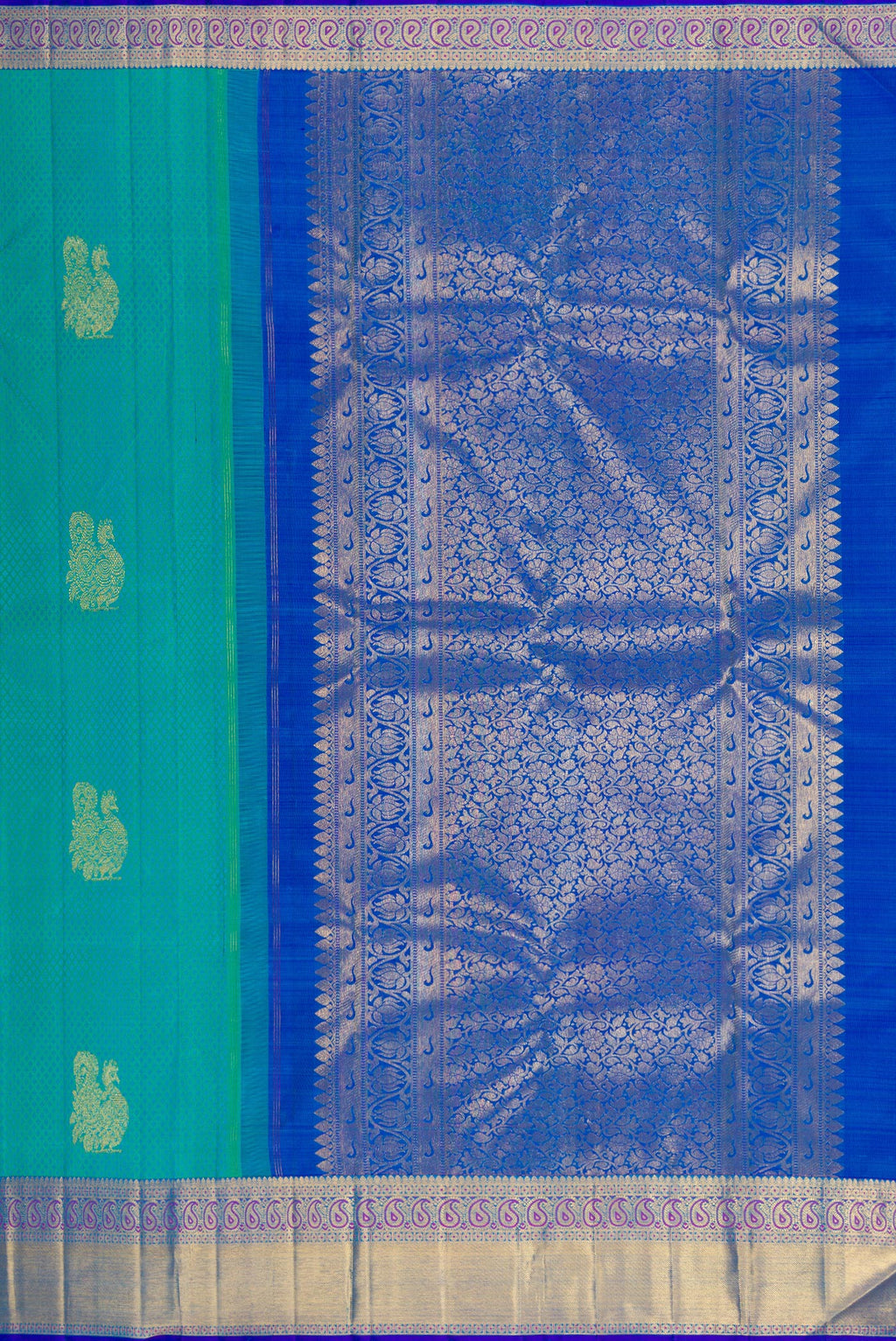 Close up image of the pallu of Sea Green Kanjivaram Silk Saree with Jacquard With Zari Butta on the body and Zari Border. 