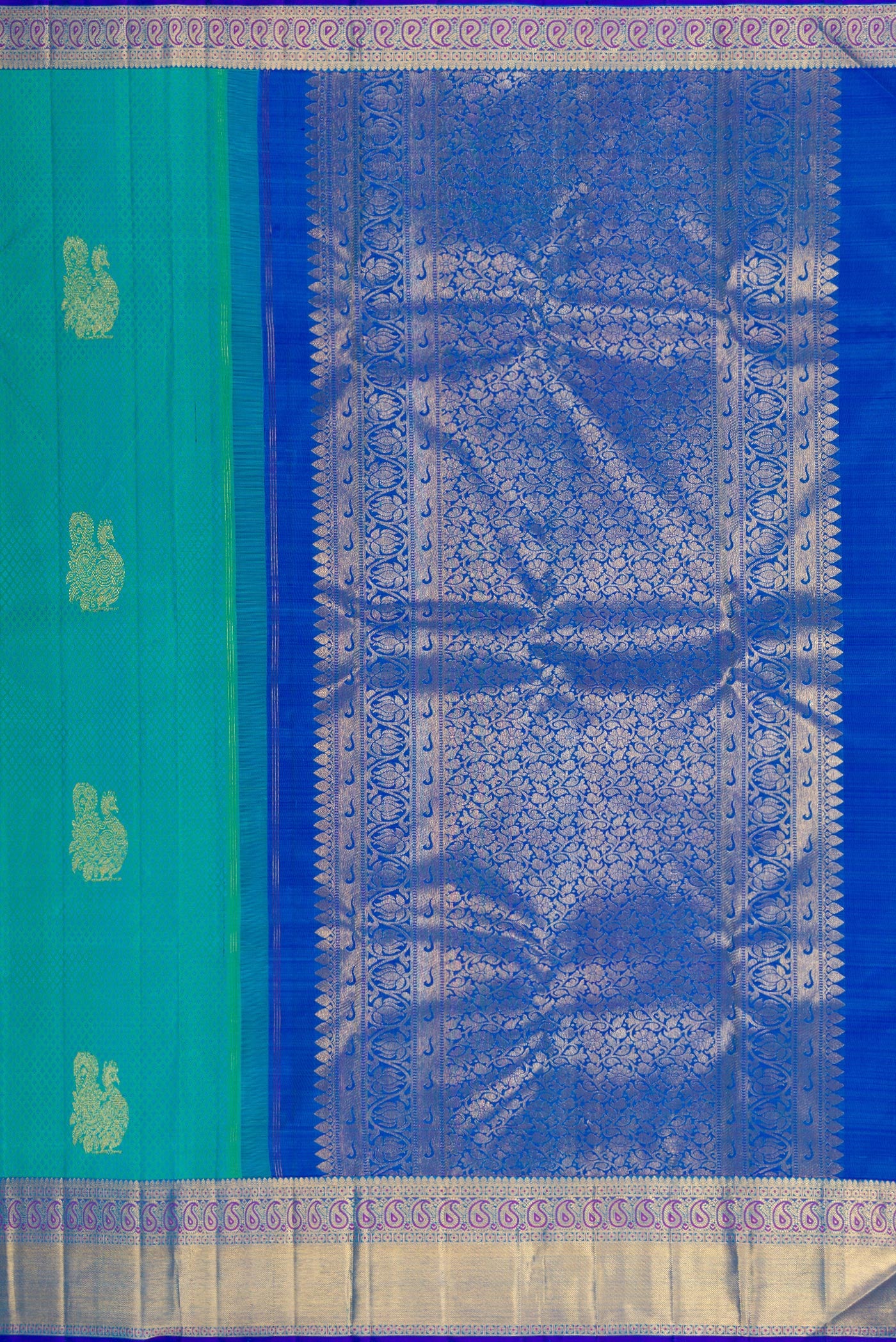 Close up image of the pallu of Sea Green Kanjivaram Silk Saree with Jacquard With Zari Butta on the body and Zari Border. 