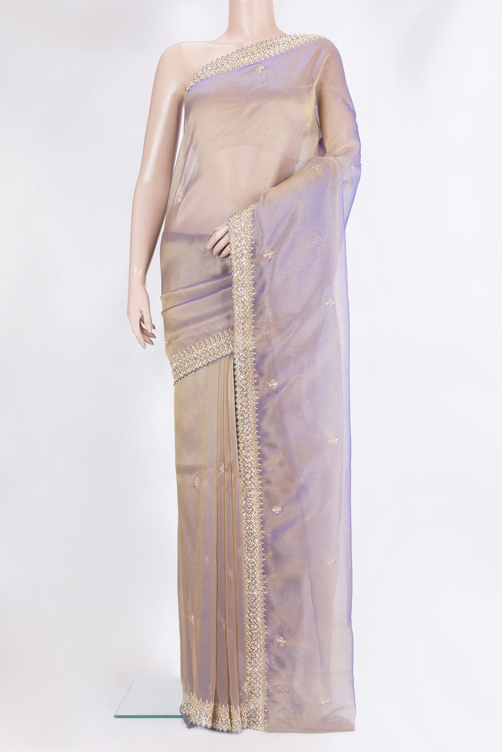 Purple Organza Silk Saree with Embroidery on the body and Sequin Border.  displayed on a mannequin