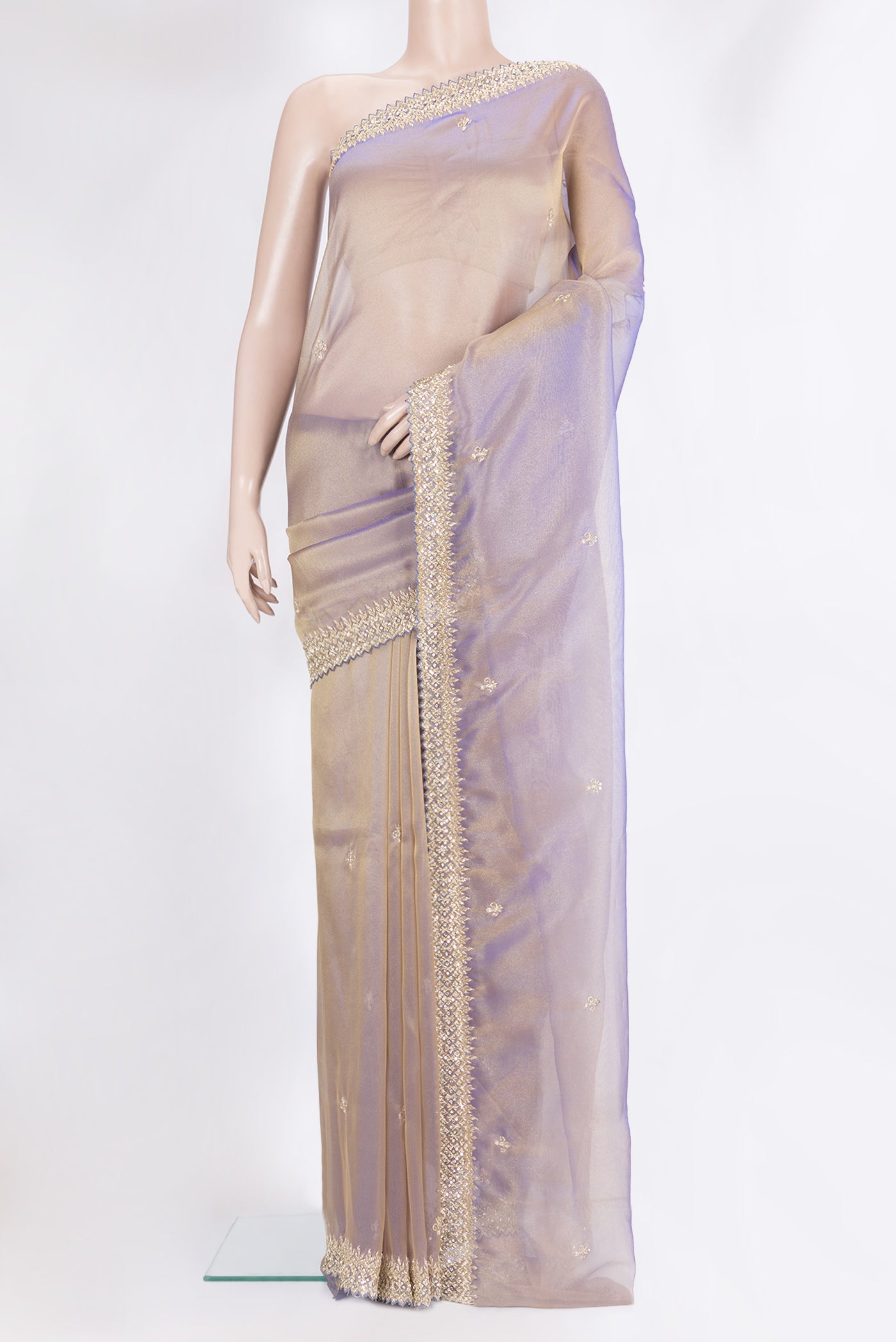 Purple Organza Silk Saree with Embroidery on the body and Sequin Border.  displayed on a mannequin