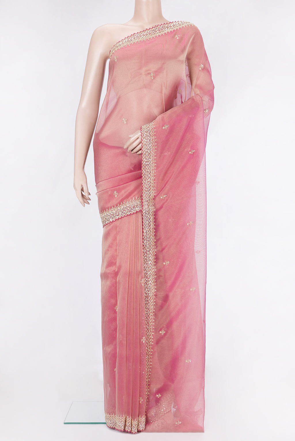 Pink Organza Silk Saree with Embroidery on the body and Sequin Border.  displayed on a mannequin