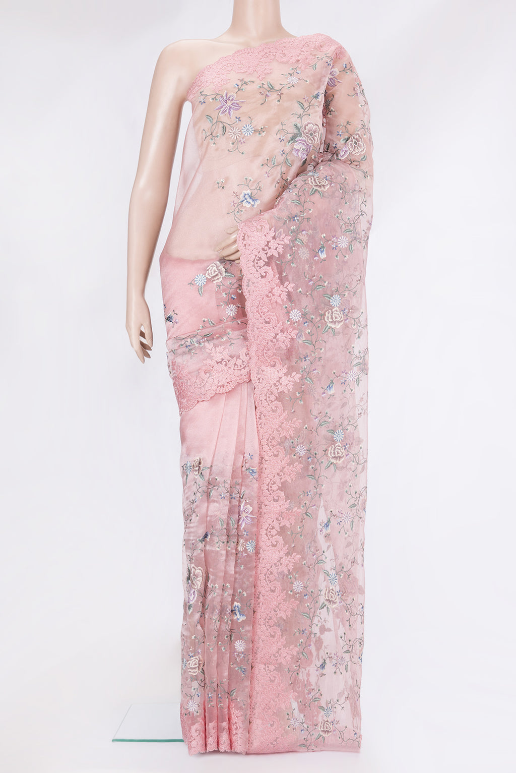 Rose pink Organza Silk Saree with Embroidery on the body and Embroidery Border.  displayed on a mannequin