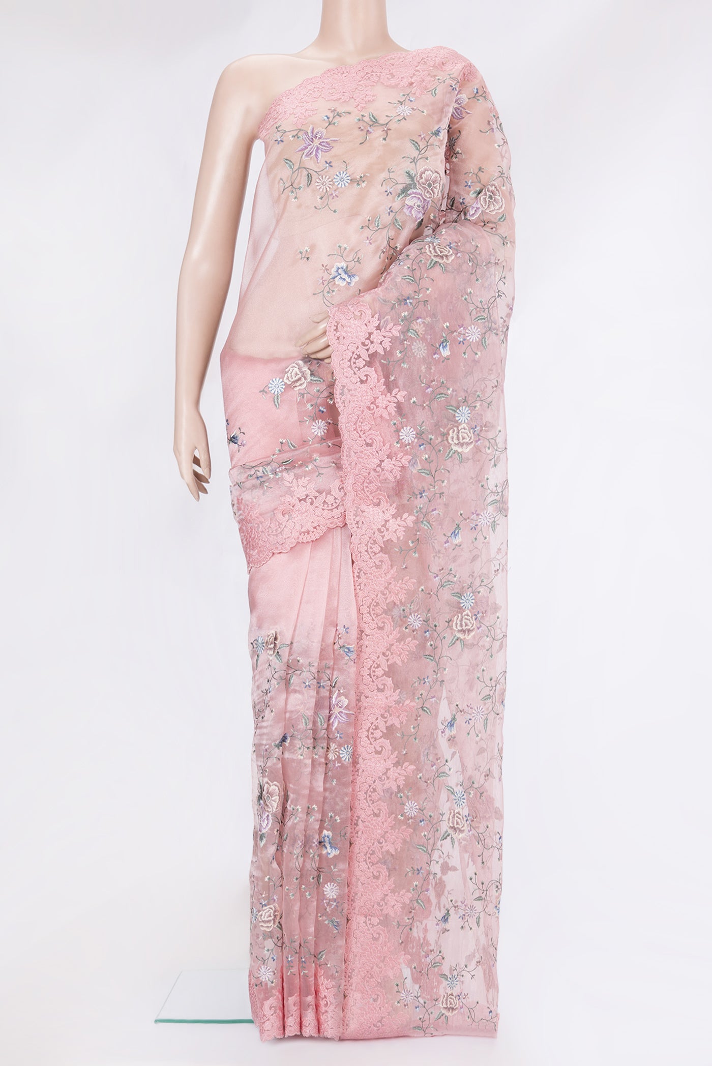 Rose pink Organza Silk Saree with Embroidery on the body and Embroidery Border.  displayed on a mannequin