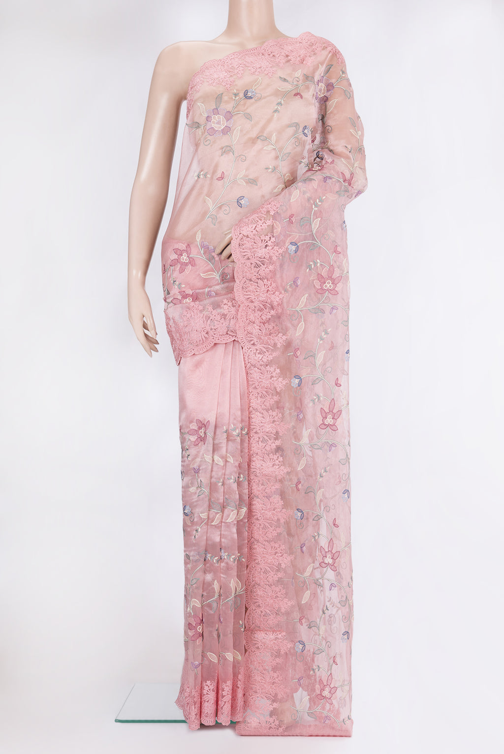 Rose pink Organza Silk Saree with Embroidery on the body and Embroidery Border.  displayed on a mannequin