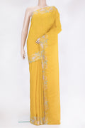 Yellow Organza Silk Saree with Plain Body and Embroidery Border.  displayed on a mannequin