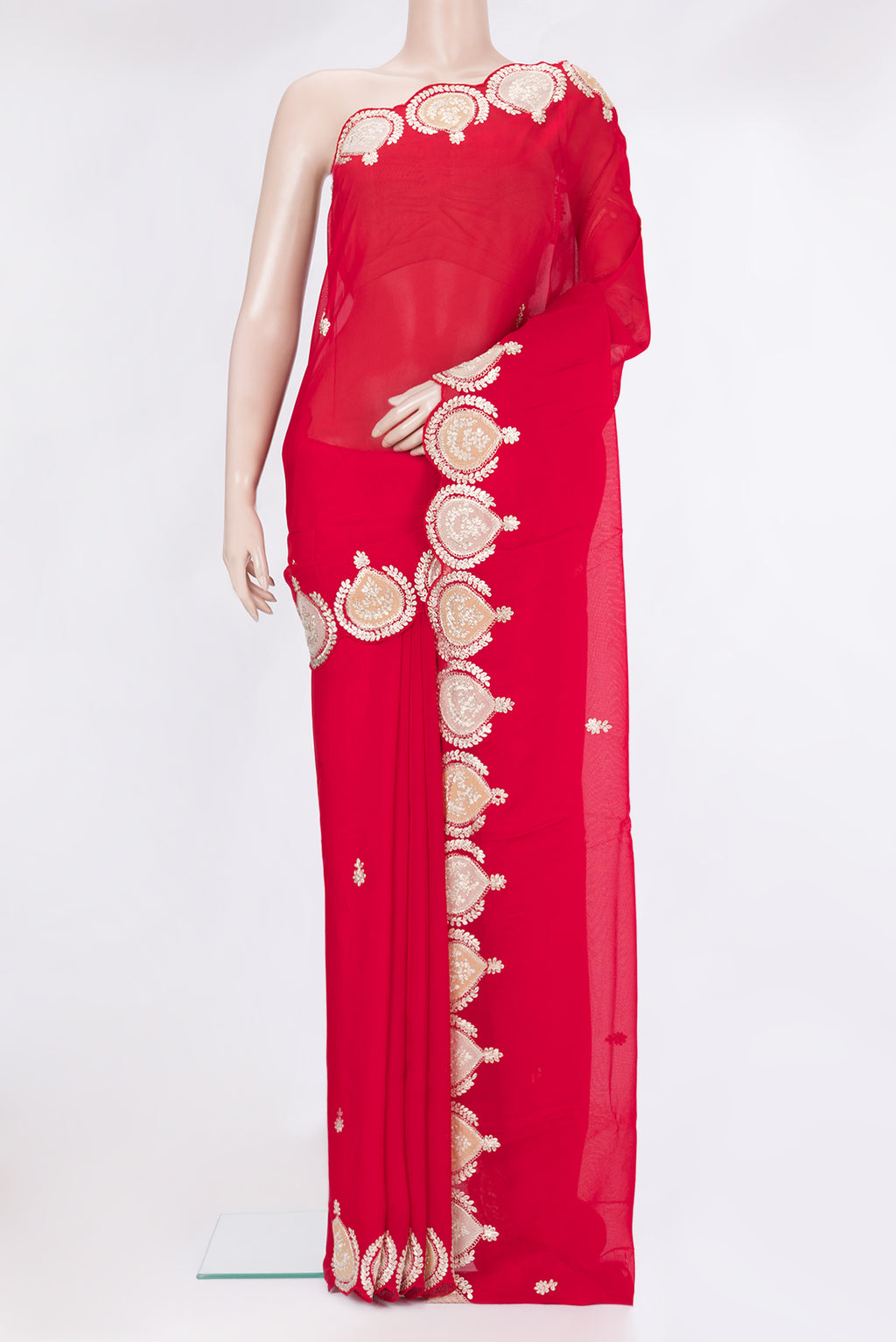 Red Organza Silk Saree with Embroidery on the body and Embroidery Border.  displayed on a mannequin