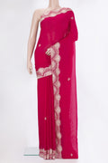 Dark Pink Organza Saree with Embroidery on the body and Embroidery Border.  displayed on a mannequin