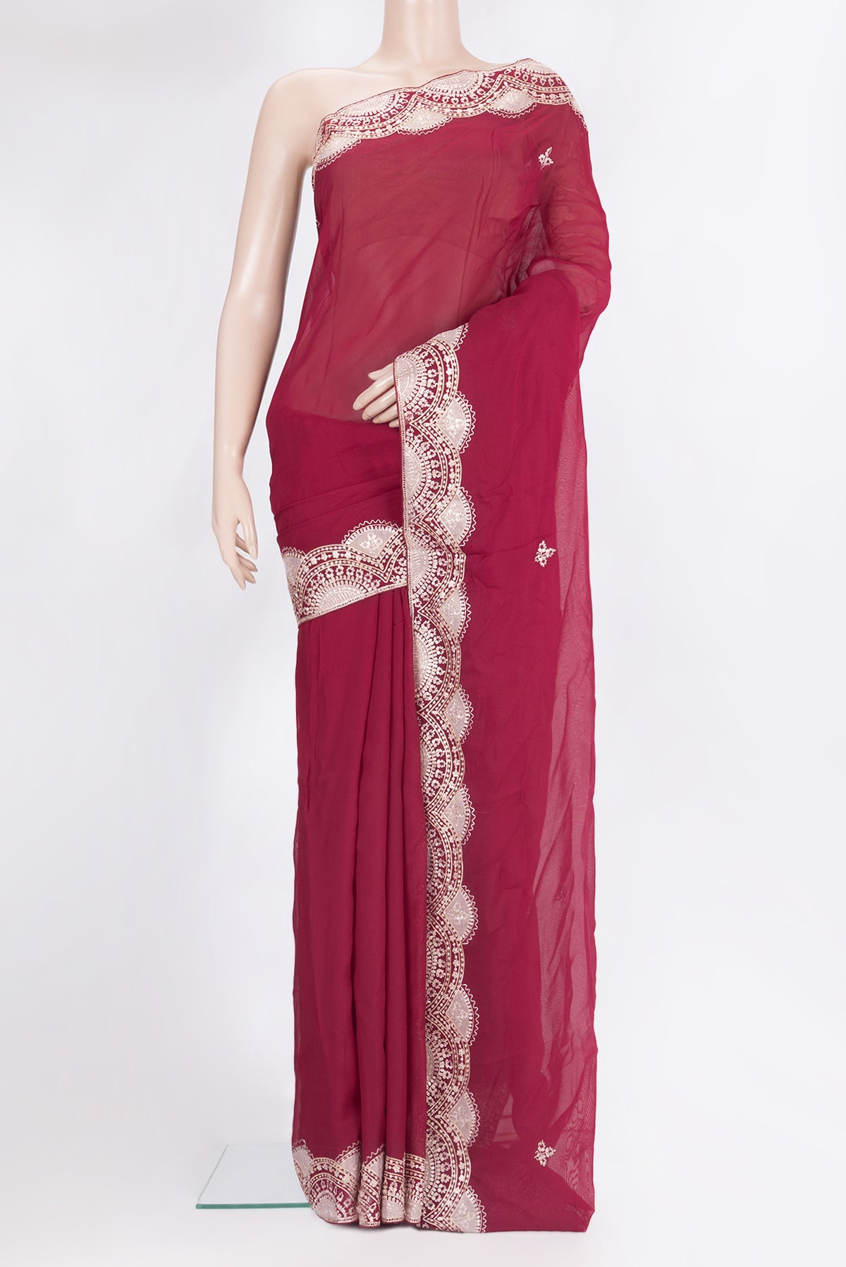 Dark Pink Banarasi Georgette Saree with Embroidery on the body and Embroidery Border.  displayed on a mannequin