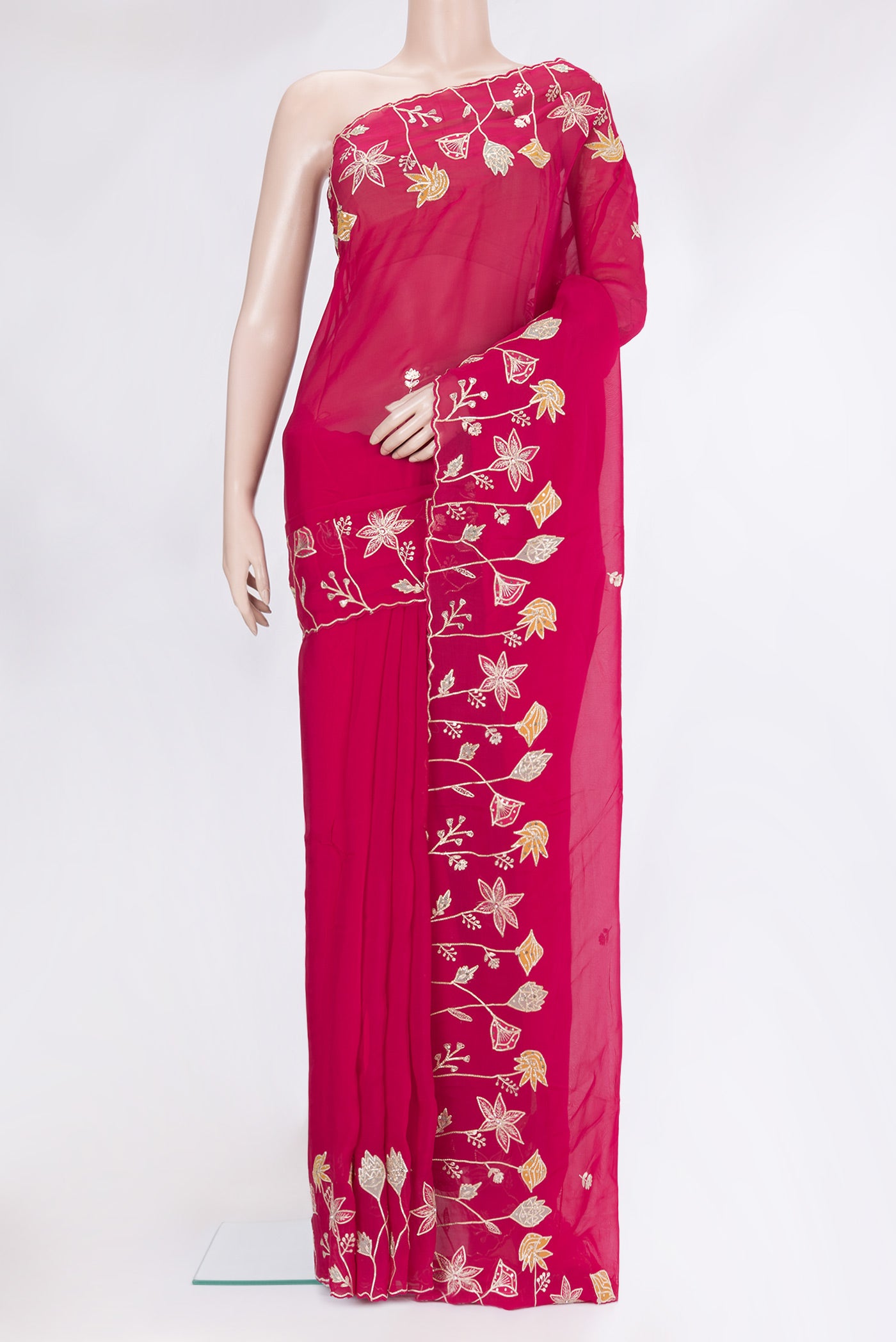 Dark Pink Organza Silk Saree with Embroidery on the body and Sequin Border.  displayed on a mannequin