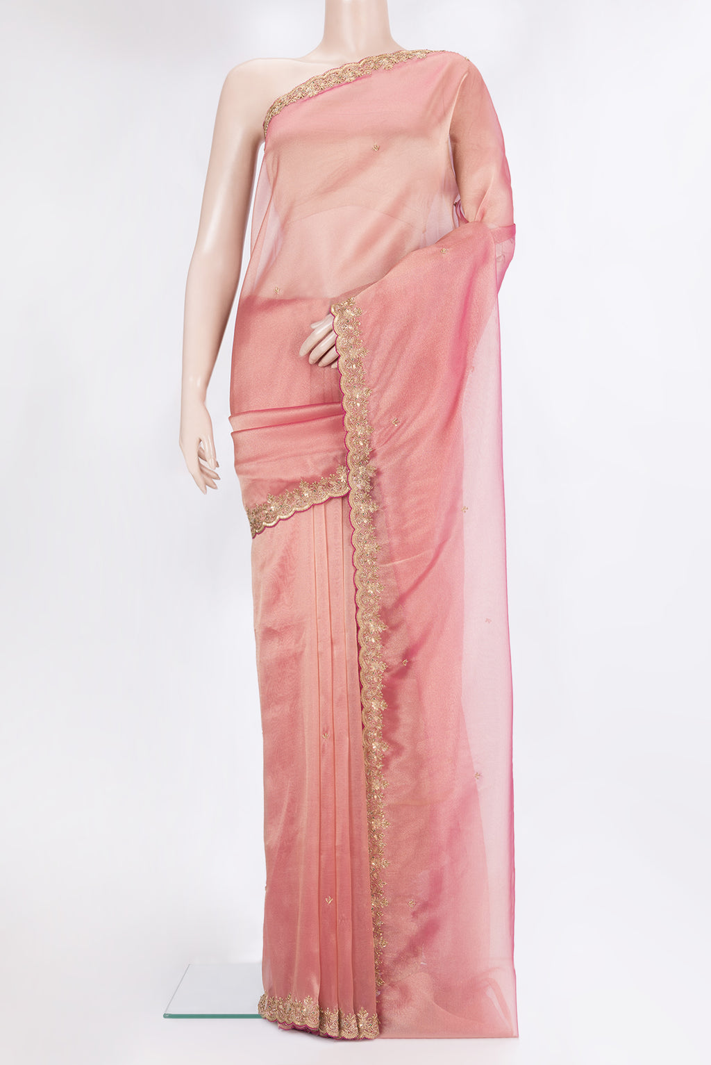 Golden Peach Dual Tone Organza Silk Saree with Embroidery on the body and Sequin Border.  displayed on a mannequin