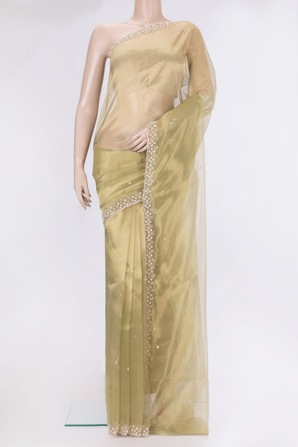 Pista Green Dual Tone Organza Silk Saree with Embroidery on the body and Sequin Border.  displayed on a mannequin