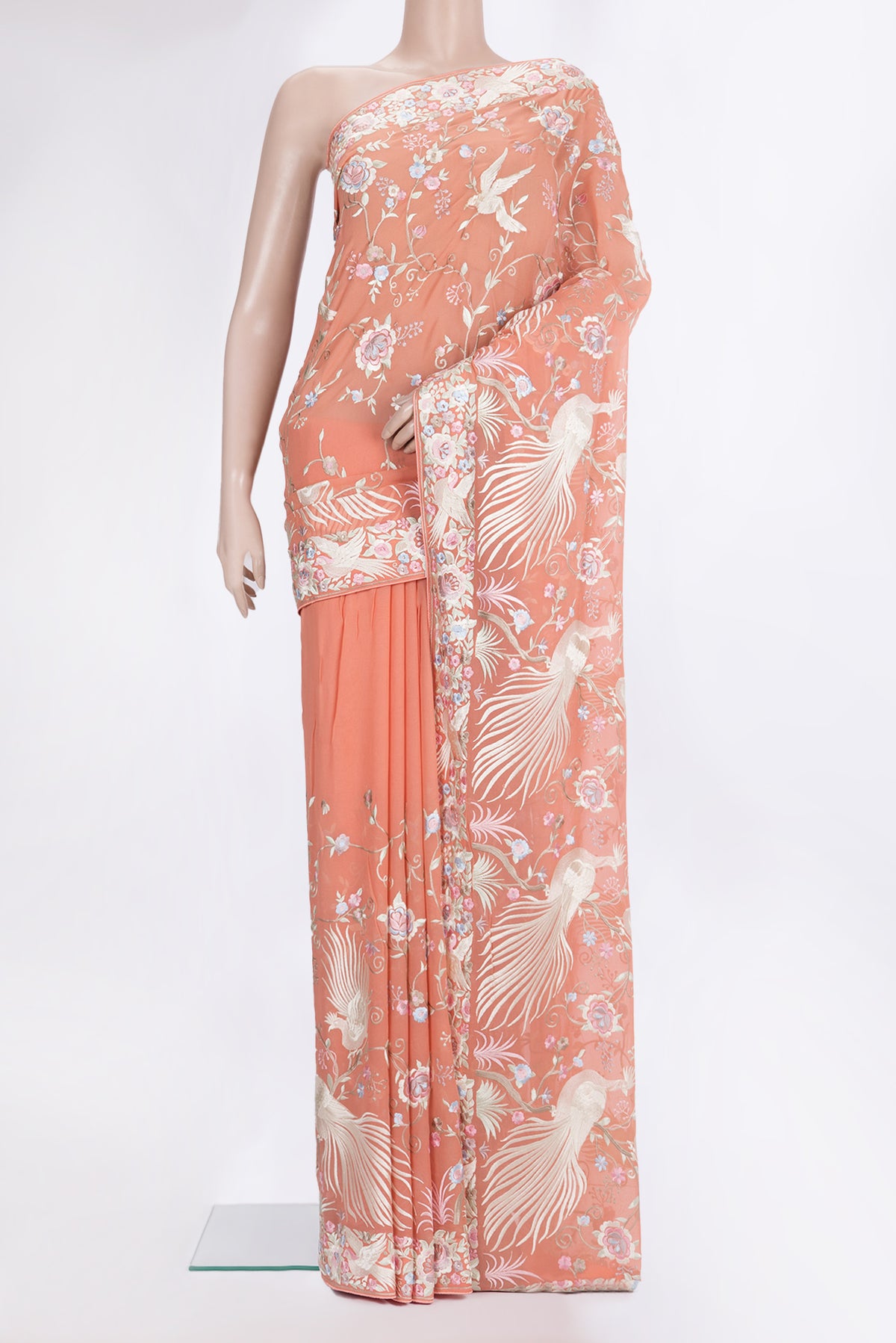Peach Parsi Embroidered Saree with Embroidered on the body and Thread Embroidered Border.  displayed on a mannequin