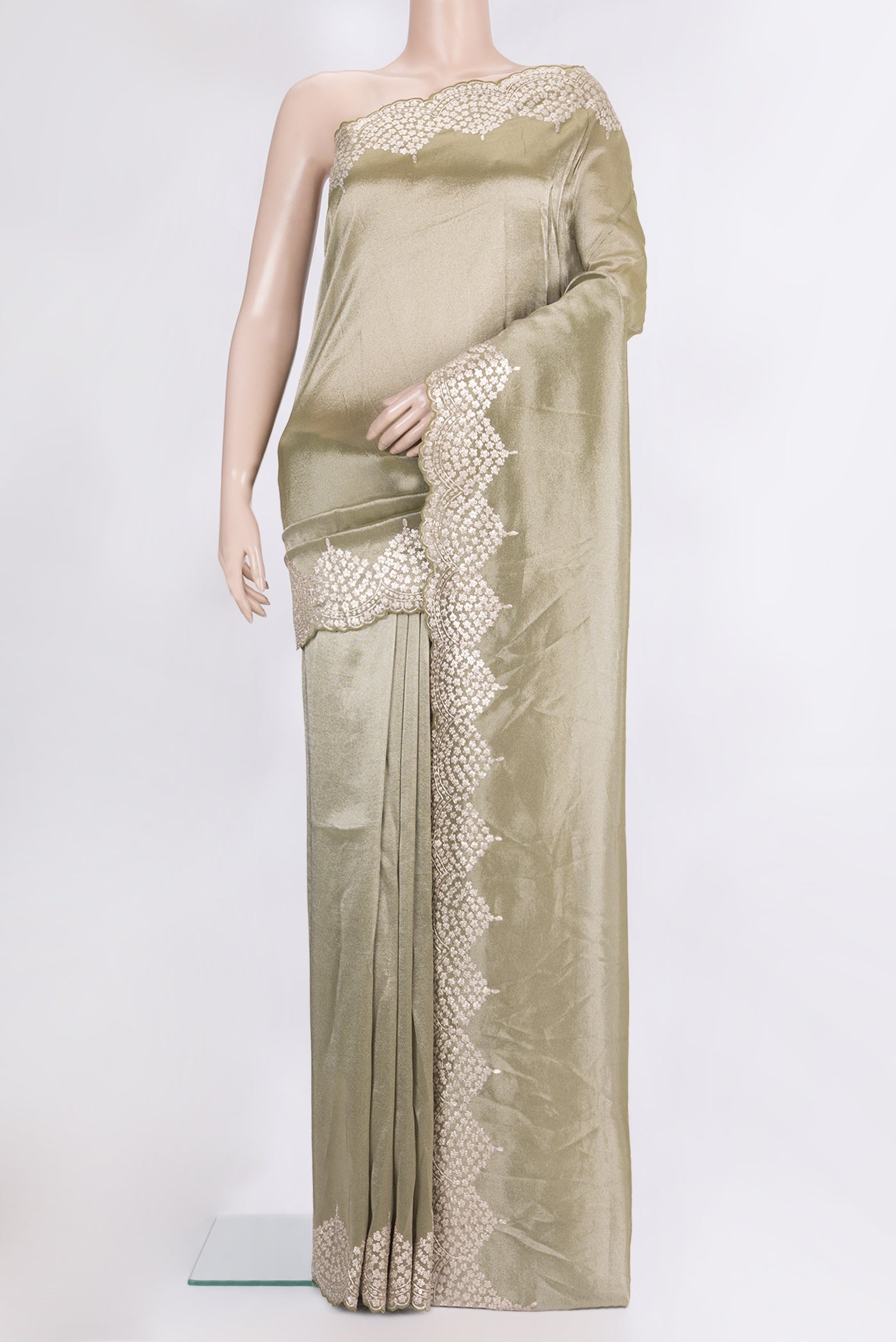 Green Dual Tone Organza Saree with Plain Body and Embroidery Border.  displayed on a mannequin