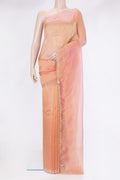 Golden Peach Organza Silk Saree with Embroidery on the body and Sequin Border.  displayed on a mannequin