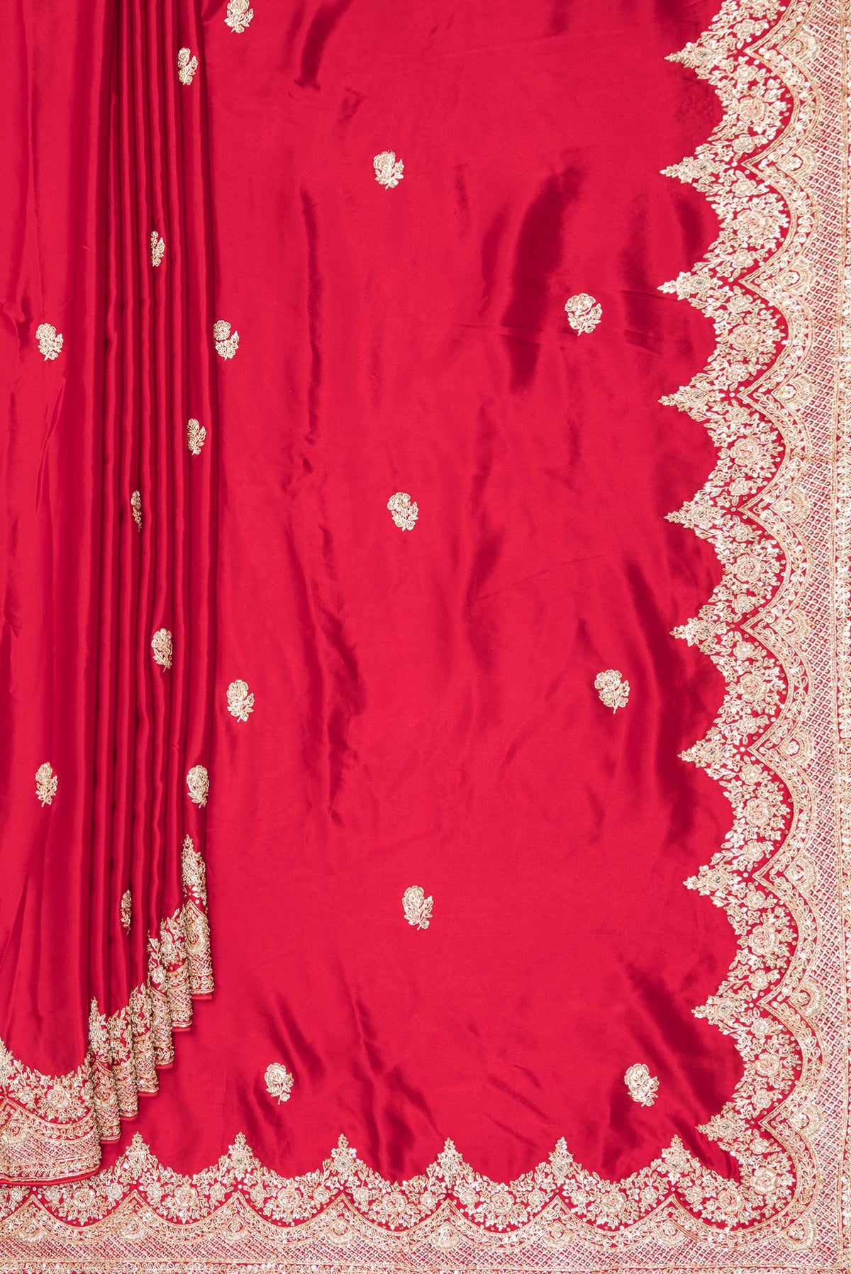 Pleats and pallu of Red Satin Saree with Embroidered on the body and Sequin Border. 