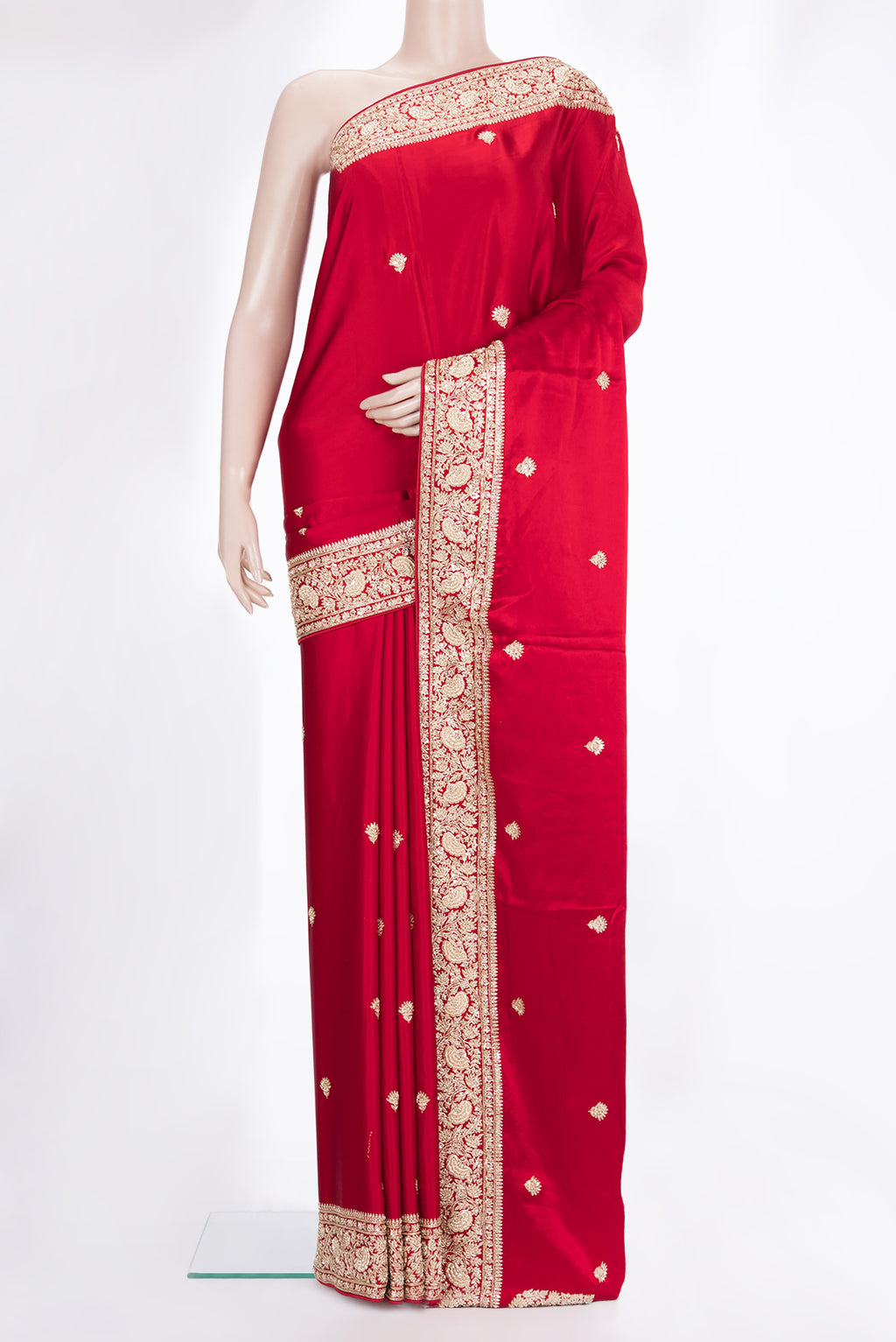 Red Satin Saree with Embroidered on the body and Sequin Border.  displayed on a mannequin