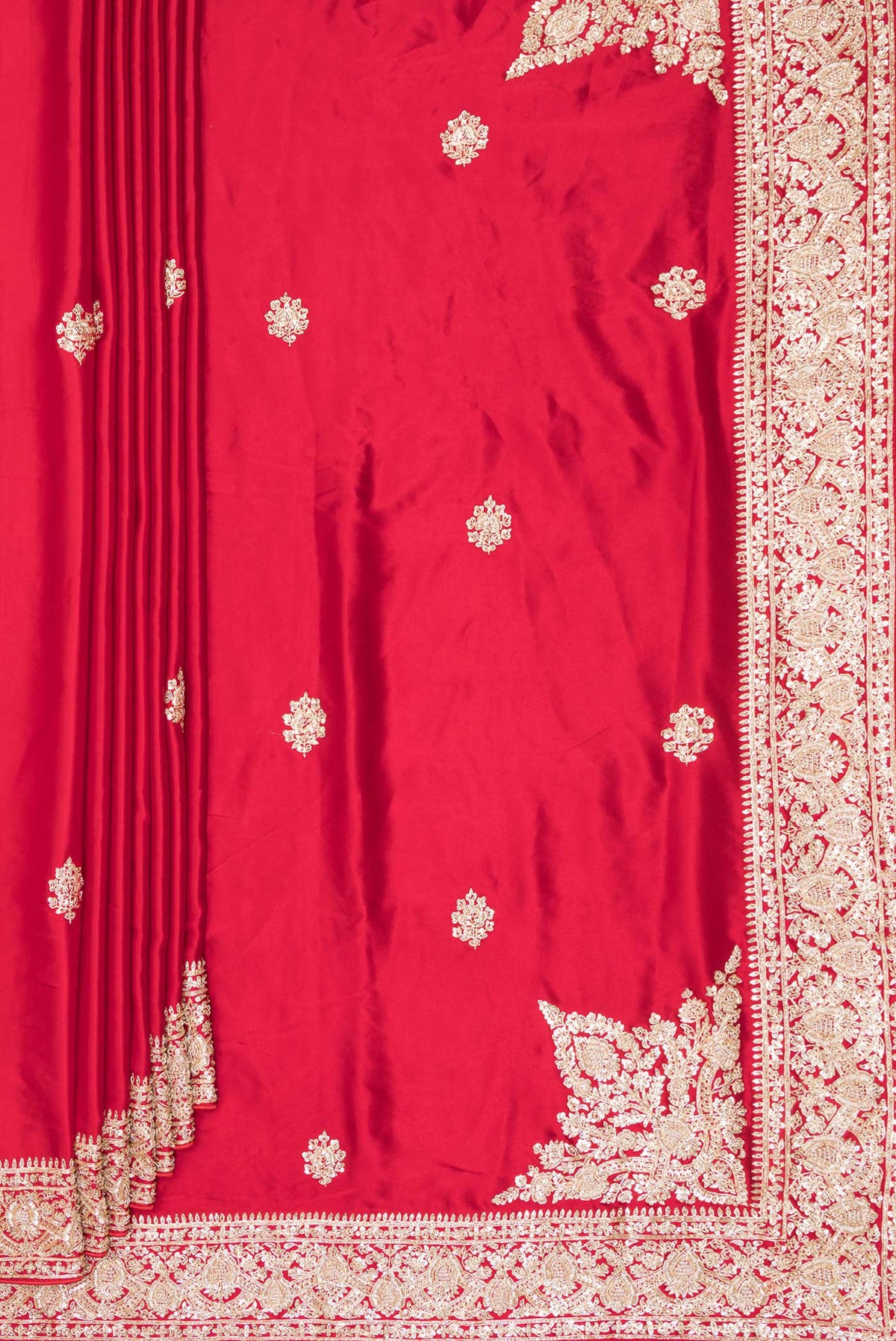 Pleats and pallu of Red Satin Saree with Embroidered on the body and Sequin Border. 