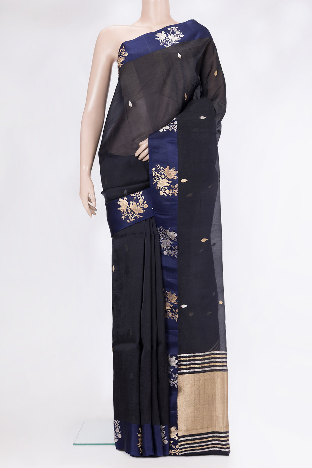 Navy Blue Organza Silk Saree with Zari Butta on the body and Fancy Border.  displayed on a mannequin