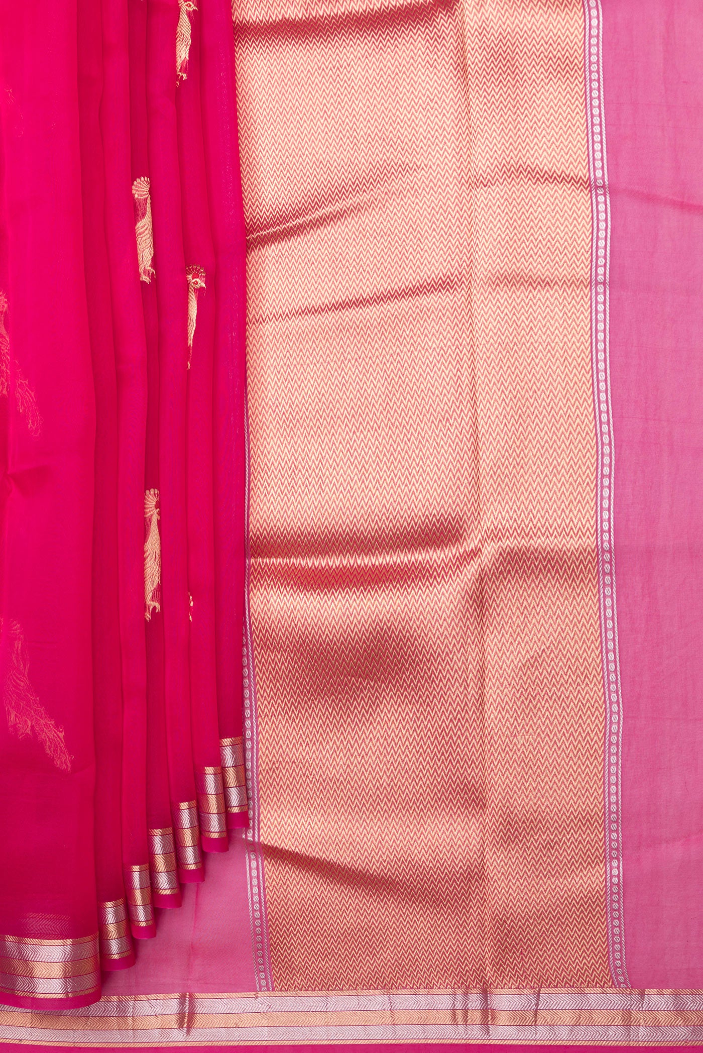 Pleats and pallu of Pink Organza Silk Saree with Zari Butta on the body and Zari Border. 