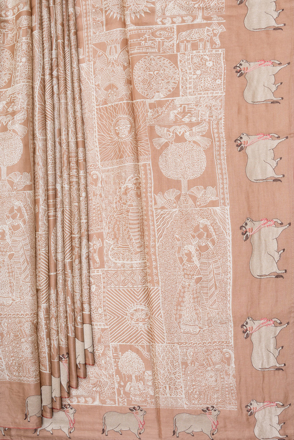 Pleats and pallu of Golden Peach Tussar Silk Saree with Printed design on the body and Fancy Border. 
