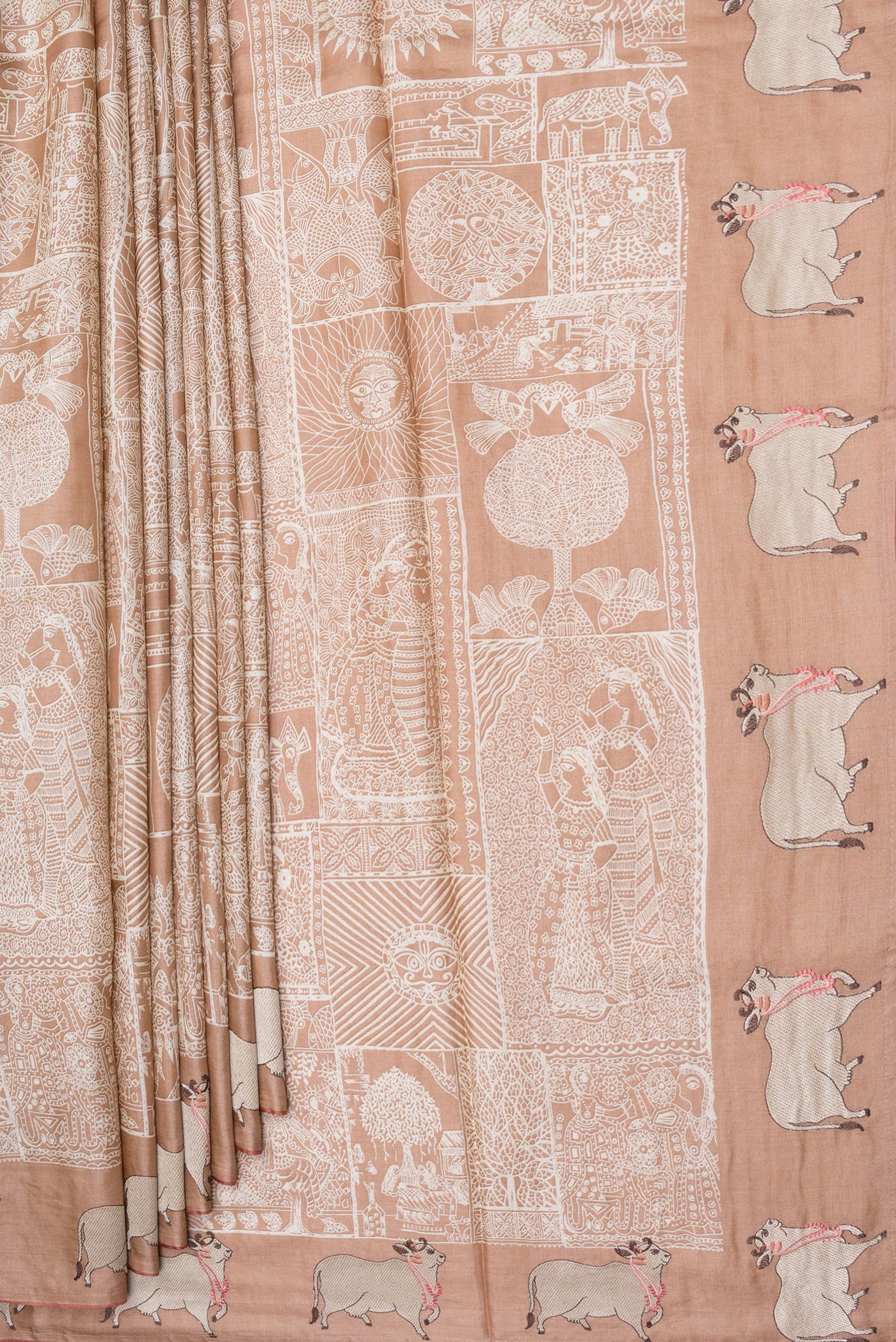 Pleats and pallu of Golden Peach Tussar Silk Saree with Printed design on the body and Fancy Border. 
