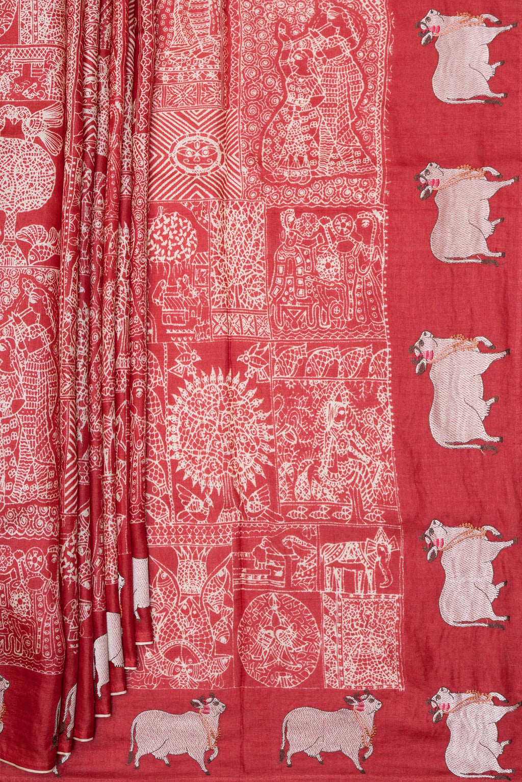 Pleats and pallu of Red Tussar Silk Saree with Printed design on the body and Fancy Border. 