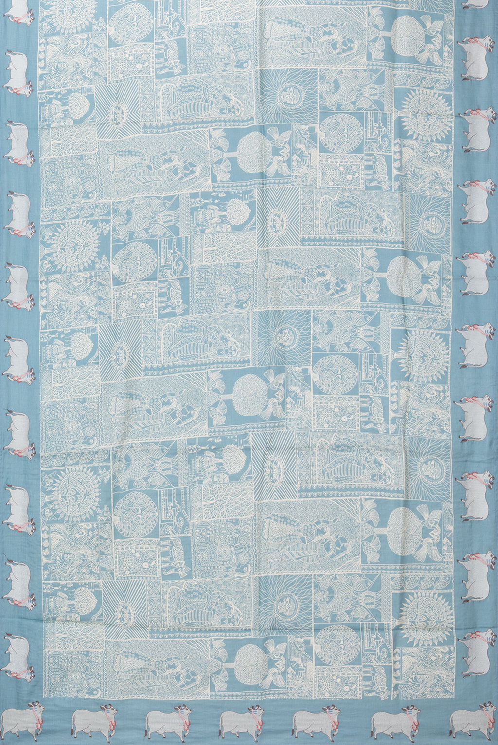 Flat view of Light Blue Tussar Silk Saree with Printed design on the body and Embroidery Border. 